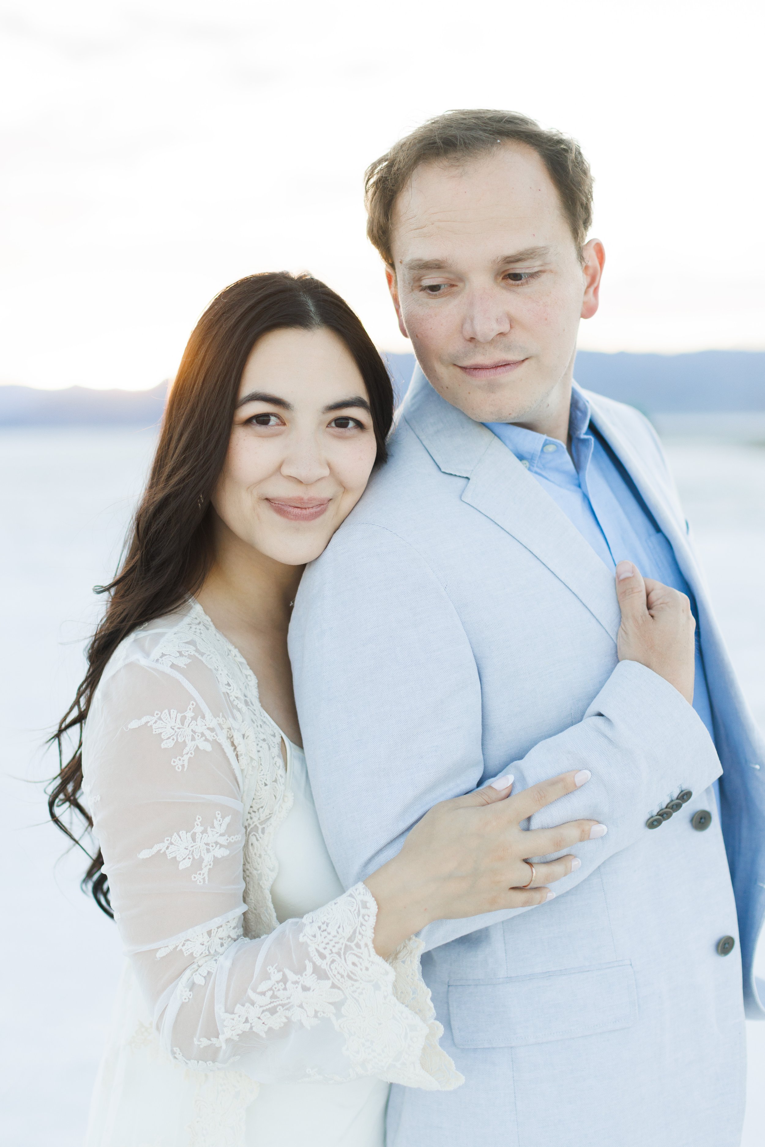  Clean timeless engagement portrait of a couple at the Salt Flats in Utah by Savanna Richardson Photography. salt flat engagements #SavannaRichardsonPhotography #SavannaRichardsonWeddings #bridals #formals #bouquets #Utahweddingphotographers #Wedding