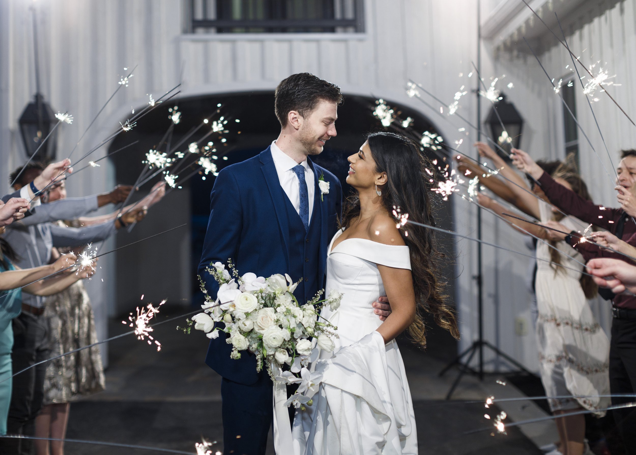  Sparkler wedding send-off for a bride and groom in Salt Lake County captured by Savanna Richardson Photography. send off ideas #SavannaRichardsonPhotography #SavannaRichardsonWeddings #bridals #formals #bouquets #Utahweddingphotographers #Wedding 