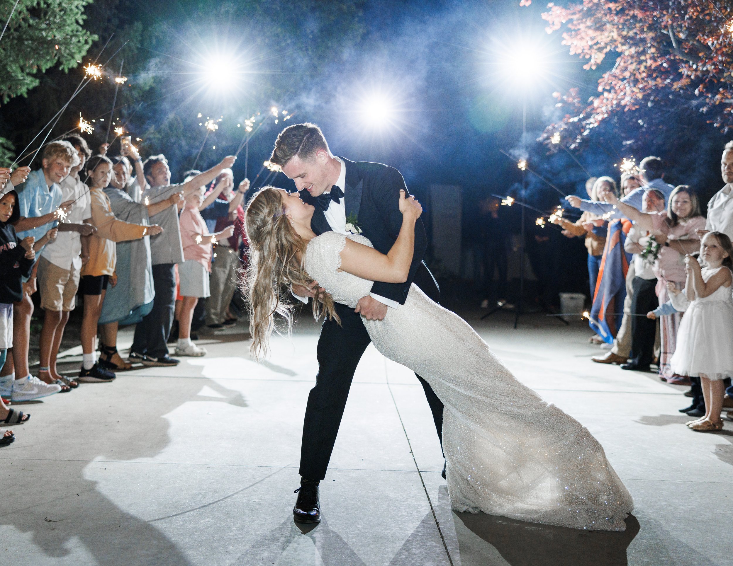  Professional Wedding Photographer Savanna Richardson Photography captures a grand wedding send-off. Spectacular Wedding Send Off #SavannaRichardsonPhotography #SavannaRichardsonWeddings #bridals #formals #bouquets #Utahweddingphotographers #Wedding 
