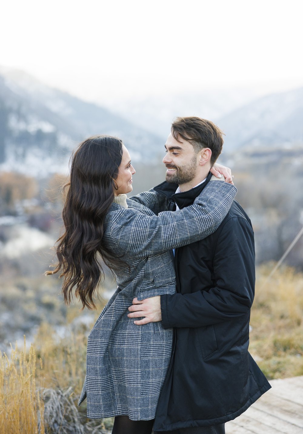  Savanna Richardson Photography captures an engaged couple embracing after the proposal in the Utah mountains. mountain engagements #SavannaRichardsonPhotography #Proposal #proposalphotography #ProProposalCompany #engaged #engagementphotography 