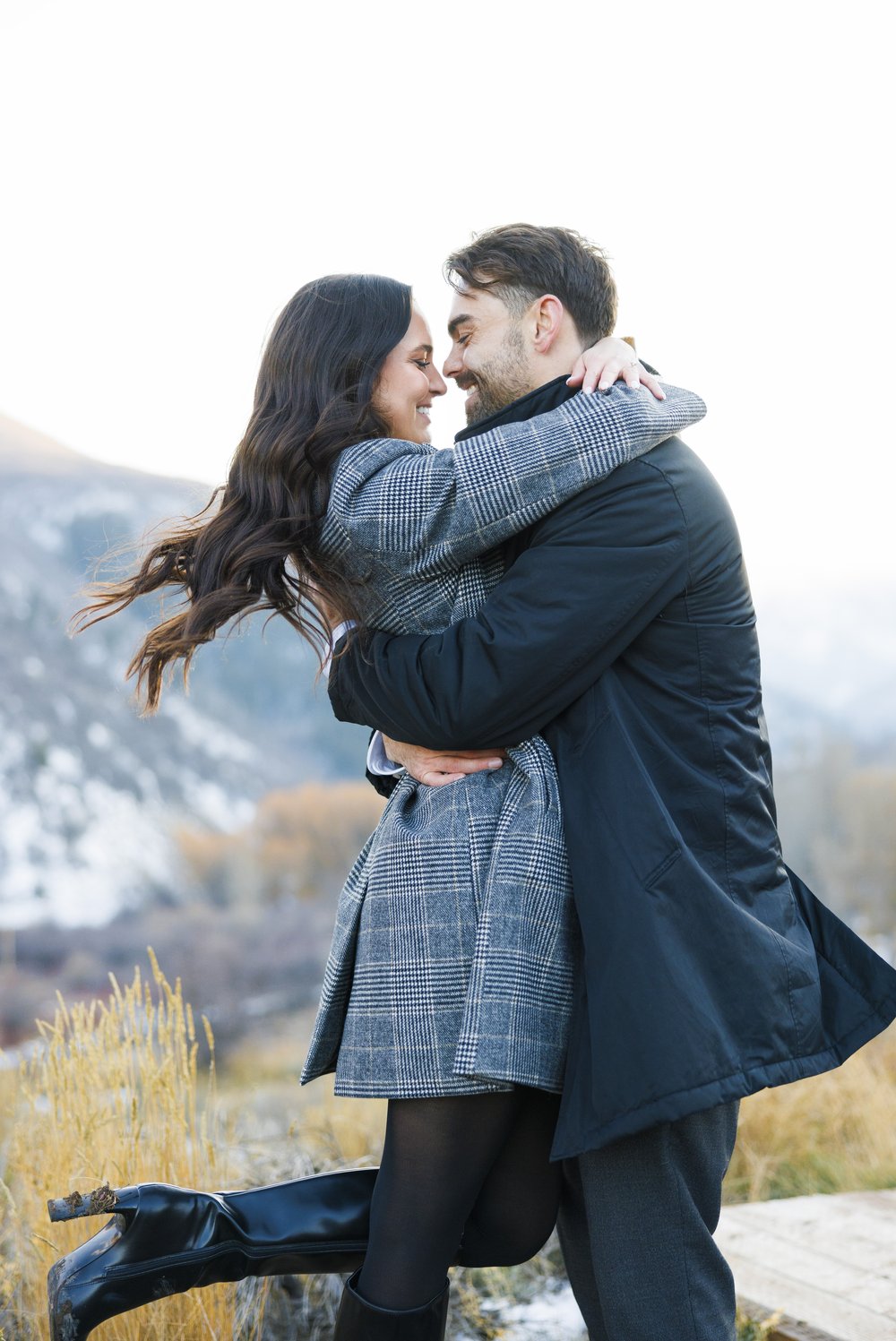  A couple twirls around together after a proposal capturing their love by Savanna Richardson Photography. in love portrait #SavannaRichardsonPhotography #Proposal #proposalphotography #ProProposalCompany #engaged #engagementphotography 