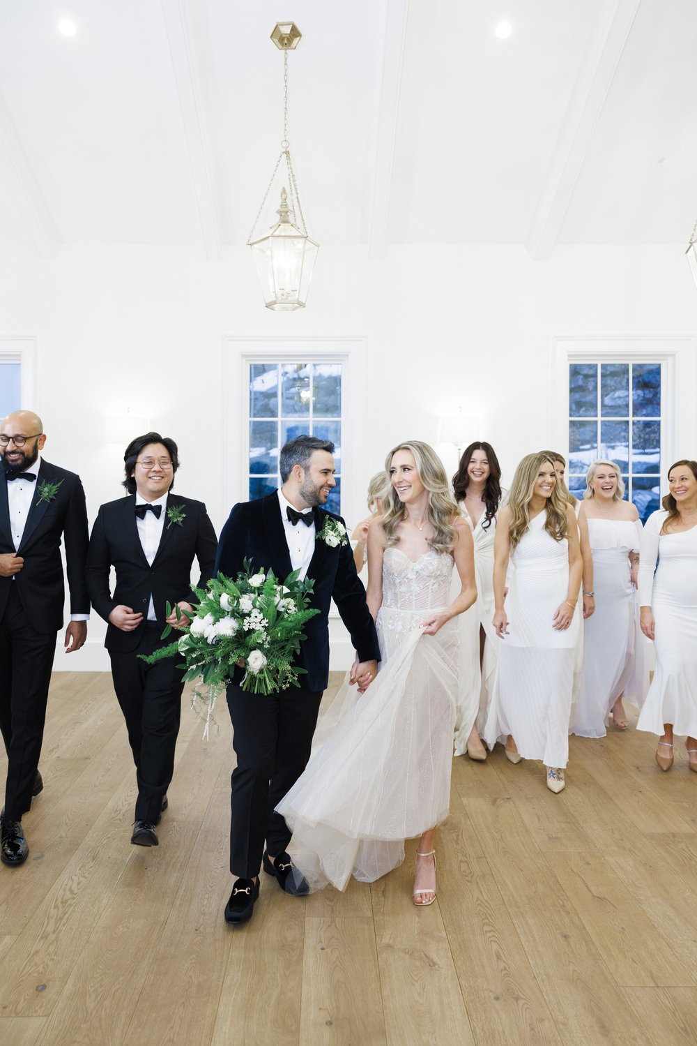  The bridal party walks onto the dance floor to party at the NYE wedding by Savanna Richardson Photography. NYE wedding #SavannaRichardsonPhotography #SavannaRichardsonWeddings #NYEwedding #magicalwedding #snowywedding #holidaywedding #married 