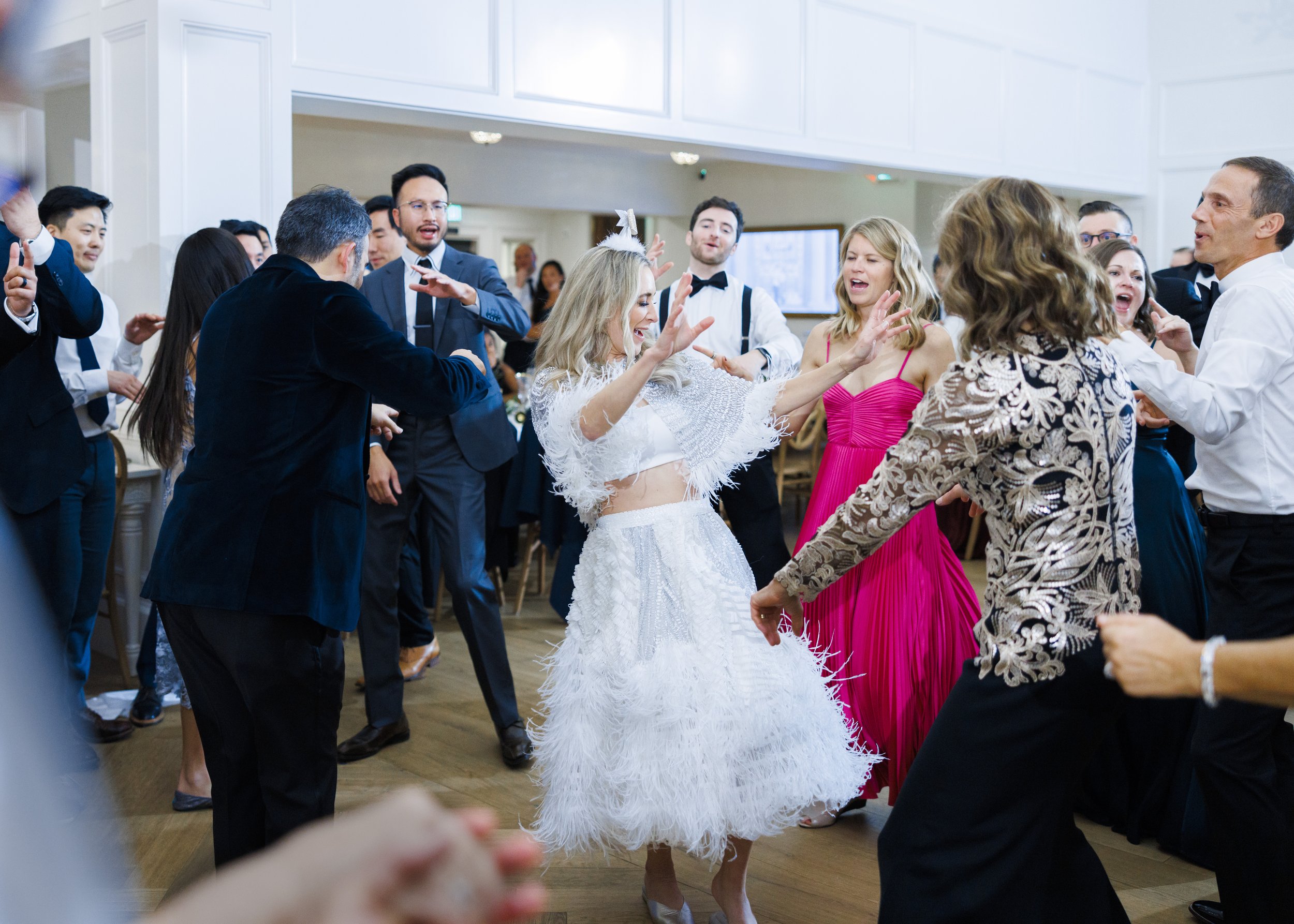  Savanna Richardson Photography captures the bride in a fun sequin dress dancing at the reception. reception dress fun #SavannaRichardsonPhotography #SavannaRichardsonWeddings #NYEwedding #magicalwedding #snowywedding #holidaywedding #married 
