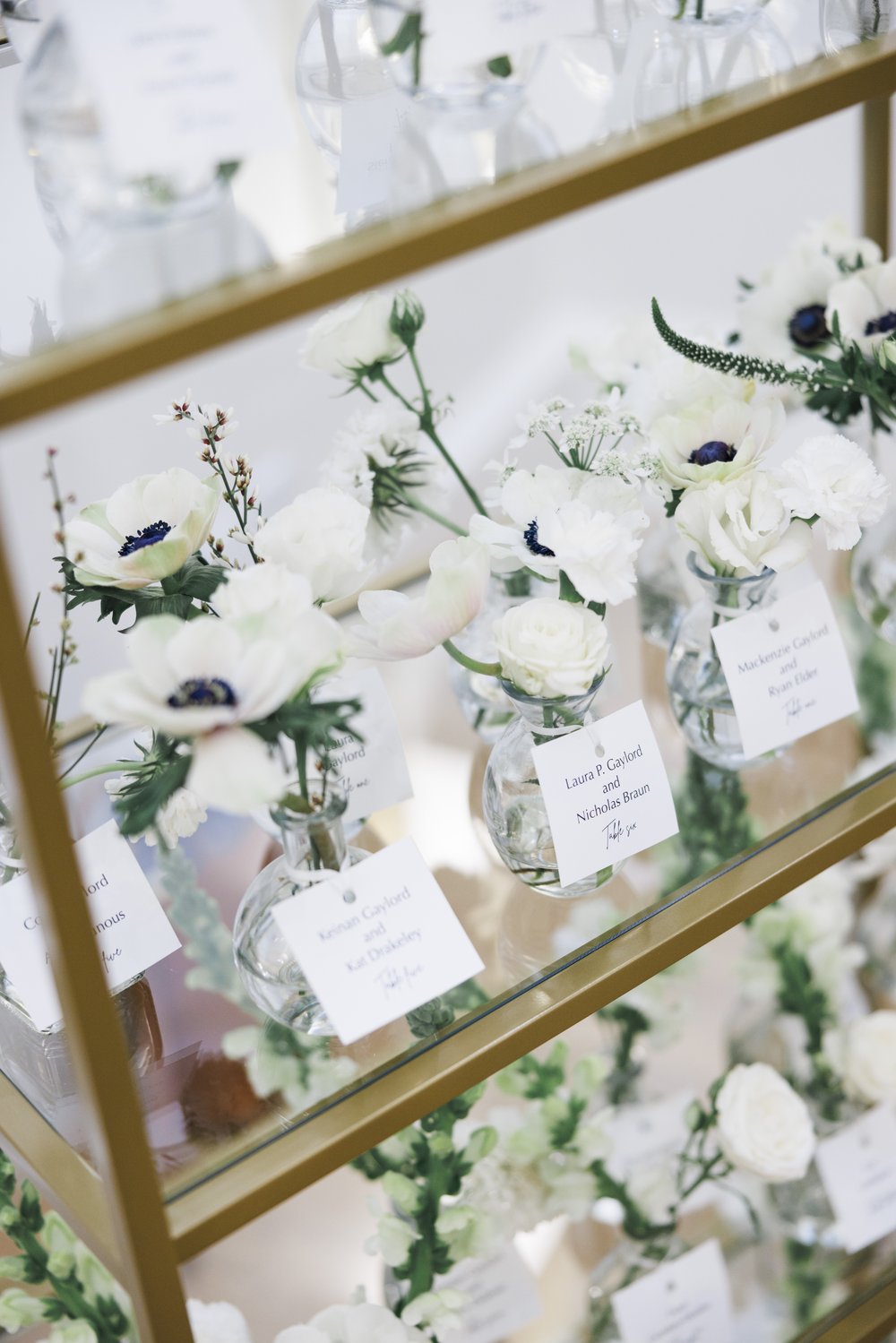  Floral arrangements for the wedding day with notecards by Professional Savanna Richardson Photography. wedding details floral #SavannaRichardsonPhotography #SavannaRichardsonWeddings #NYEwedding #magicalwedding #snowywedding #holidaywedding #married