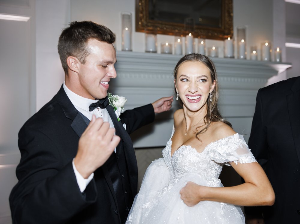  The bride and groom dance at the reception, and Savanna Richardson Photography captures it with flash photography. wedding #SavannaRichardsonPhotography #SavannaRichardsonTips #WeddingTips #PhotographyTips #weddingrecepiton #flashphotography 