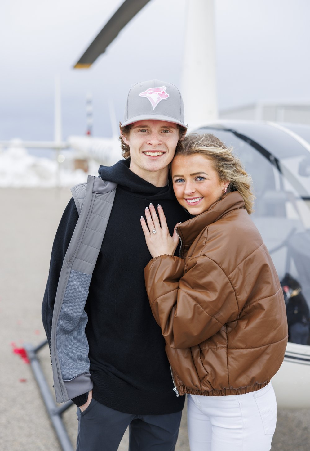  Bride and groom smiling for a portrait during a helicopter proposal captured by Savanna Richardson Photography. Professional proposal photographers in Northern Utah #SavannaRichardsonPhotography #SavannaRichardsonEngagements #utahproposals #helicopt