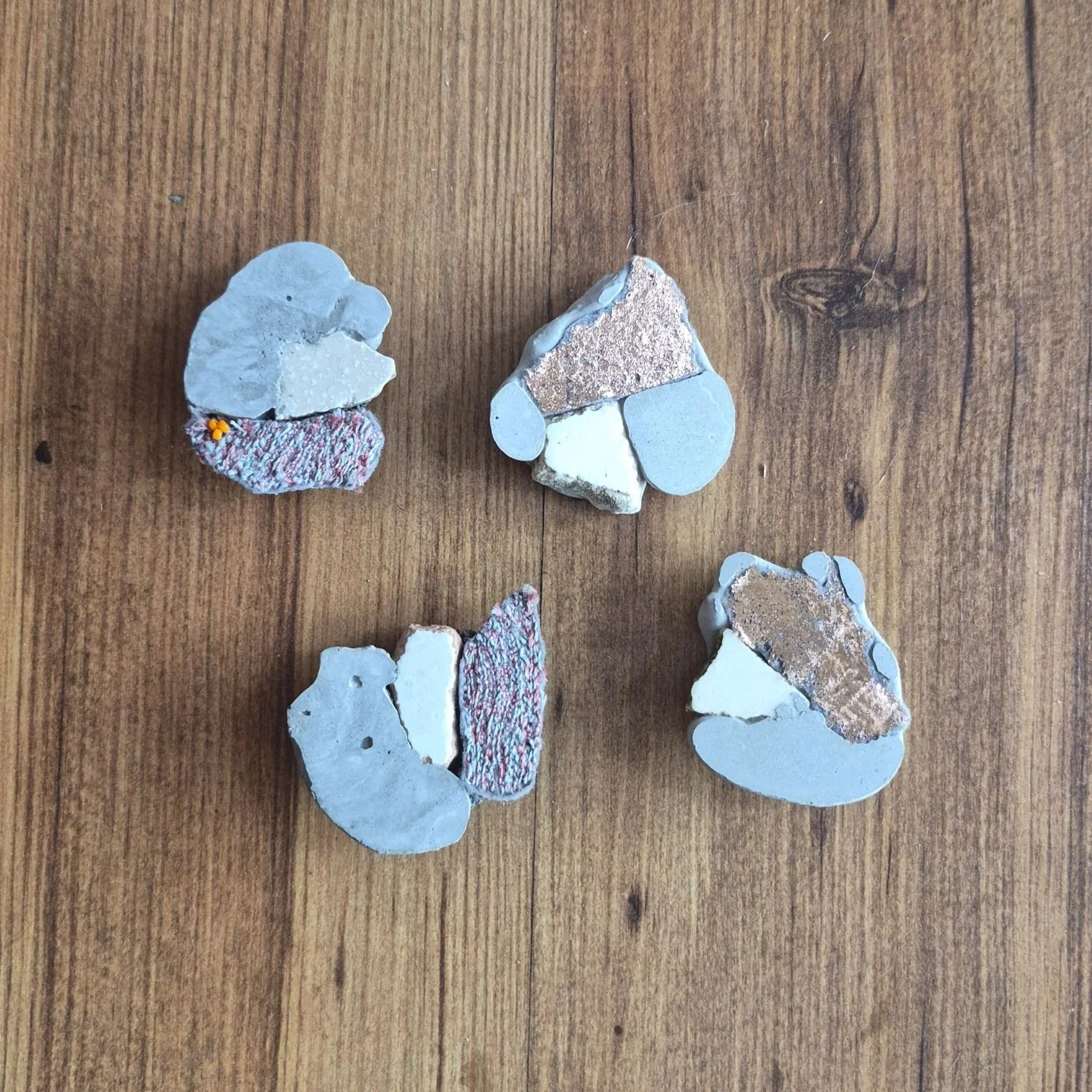 Combining free motion embroidery, concrete and tile fragments