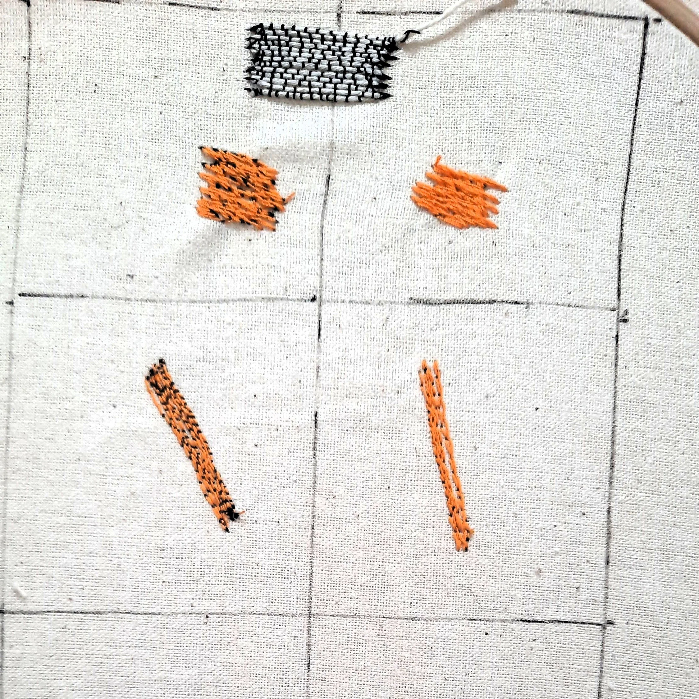 Stitch experiments on fabric by Agy textile artist