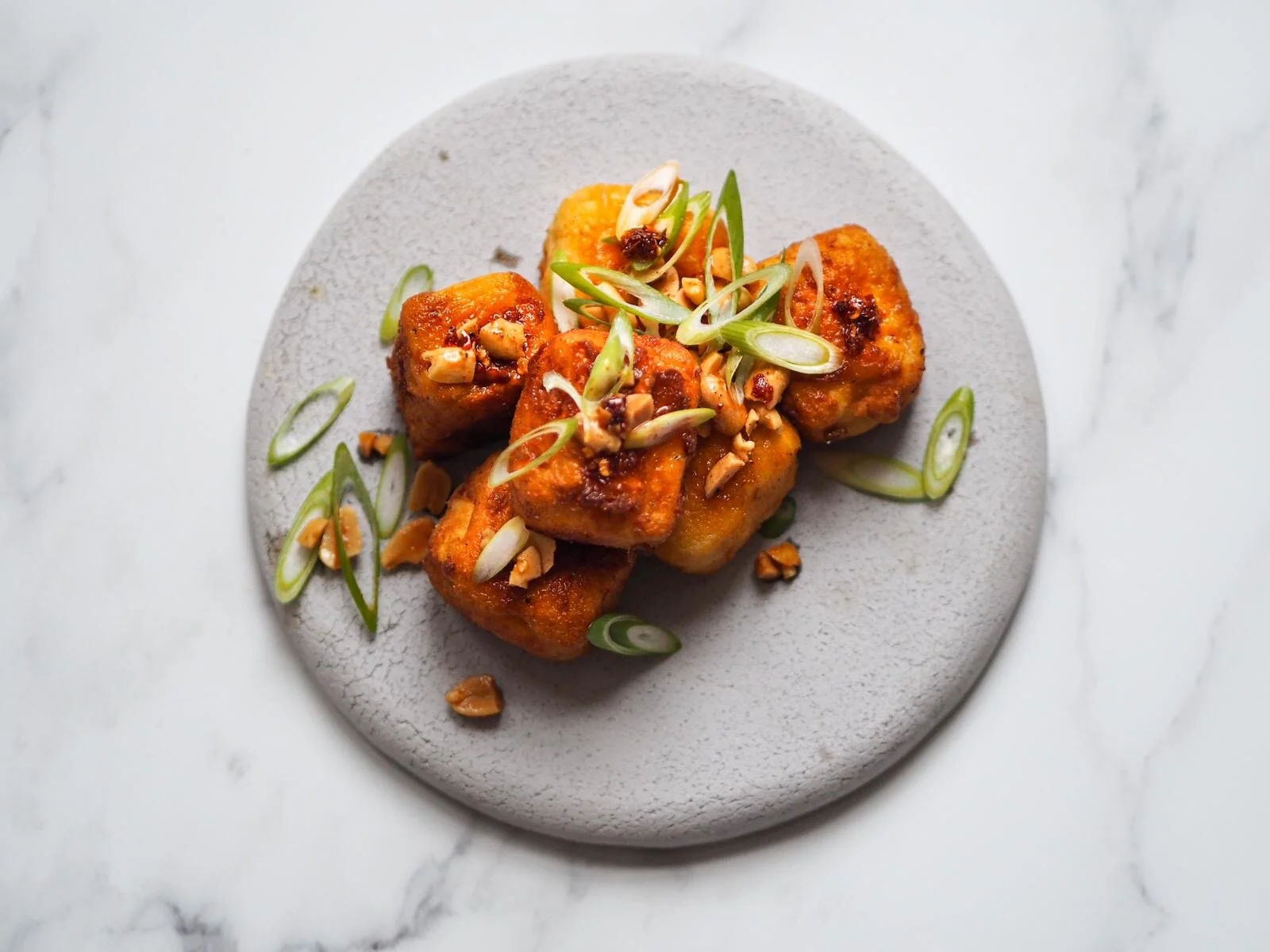 Deep fried chickpea tofu with peanuts and chilli