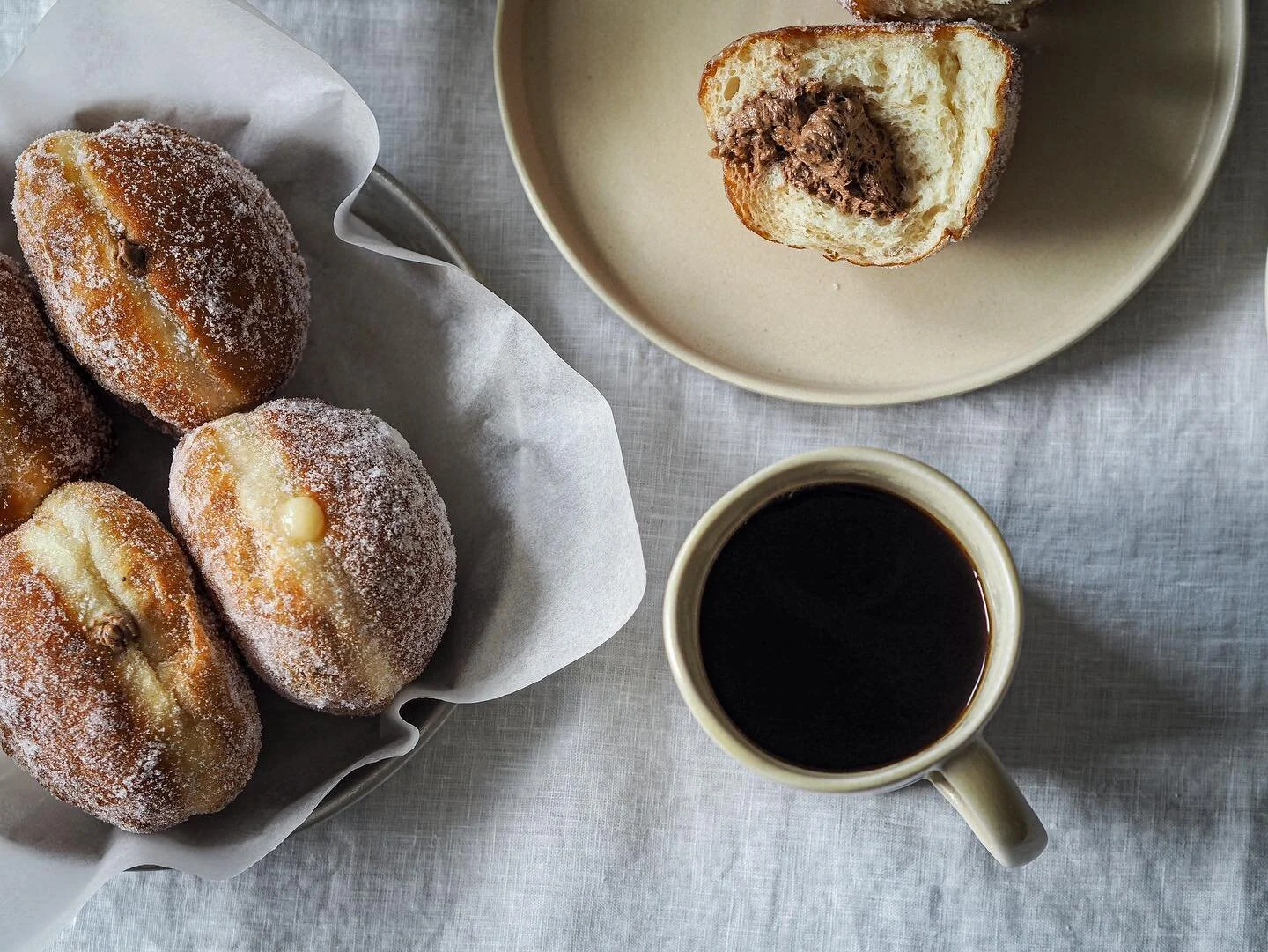 #tb donuts. Half and half filled with lemon curd and 
espresso/chocolate cream 🍩