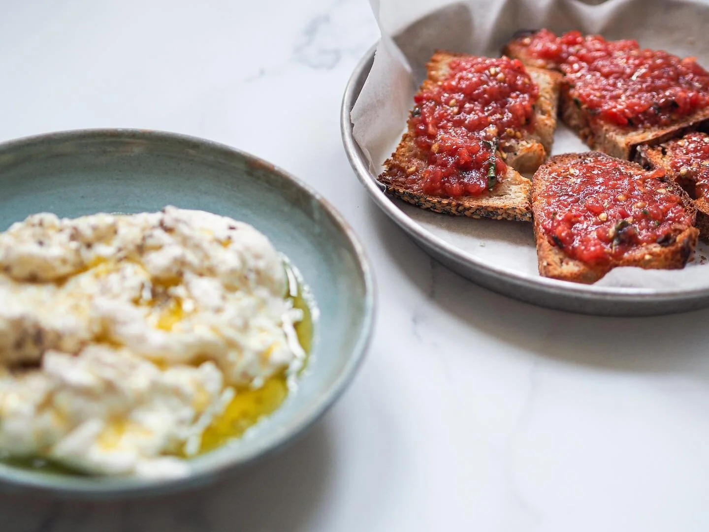 PAN CON TOMATE with BURRATA to make it even better!! Because everything is nicer with burrata, right? 
Semi stale toasted sourdough rubbed with a garlic clove, grated tomatoes (must be those that smell like pure sunshine, otherwise don&rsquo;t bother