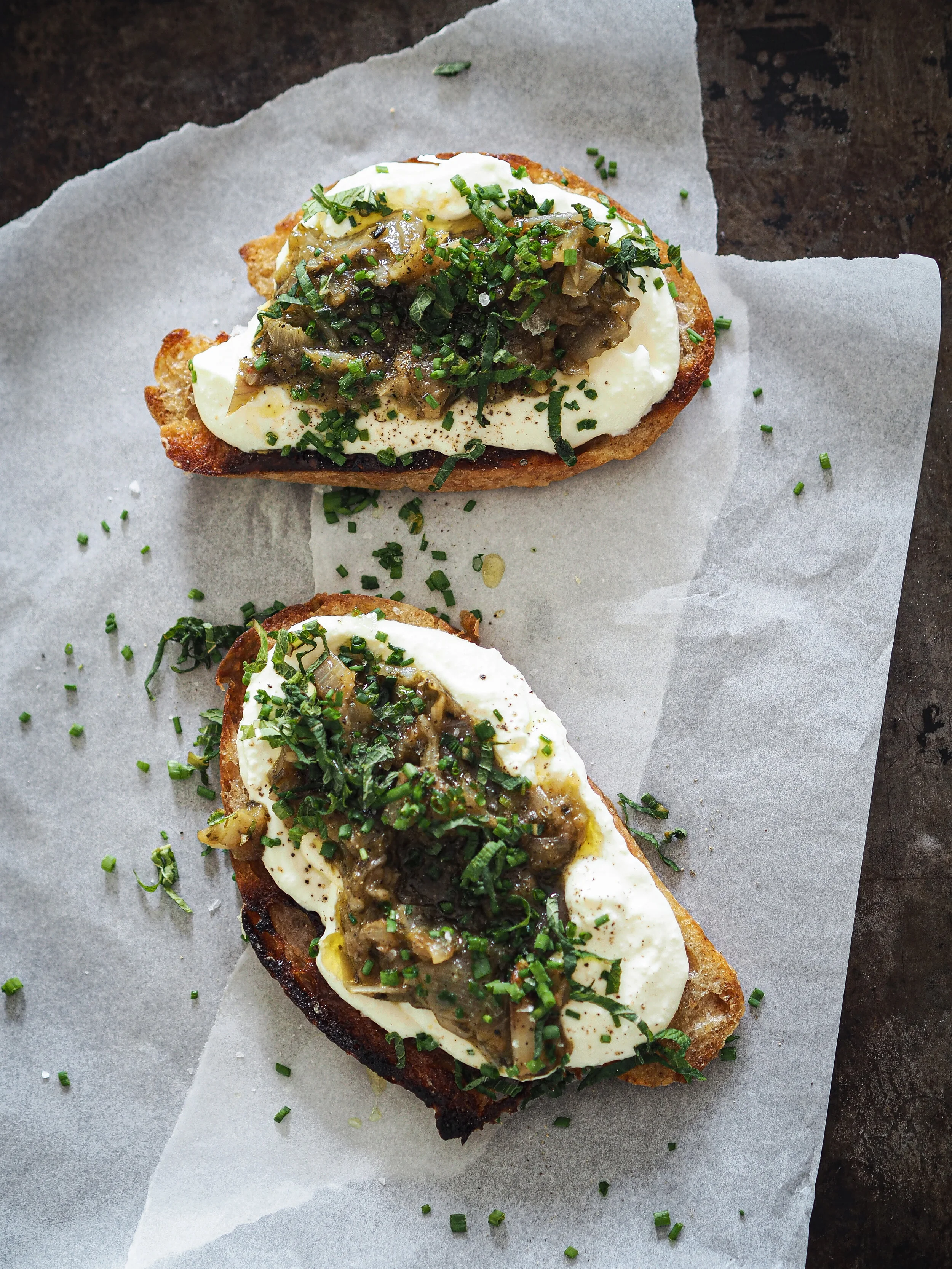 Homemade ricotta on sourdough toast with roasted shallots 