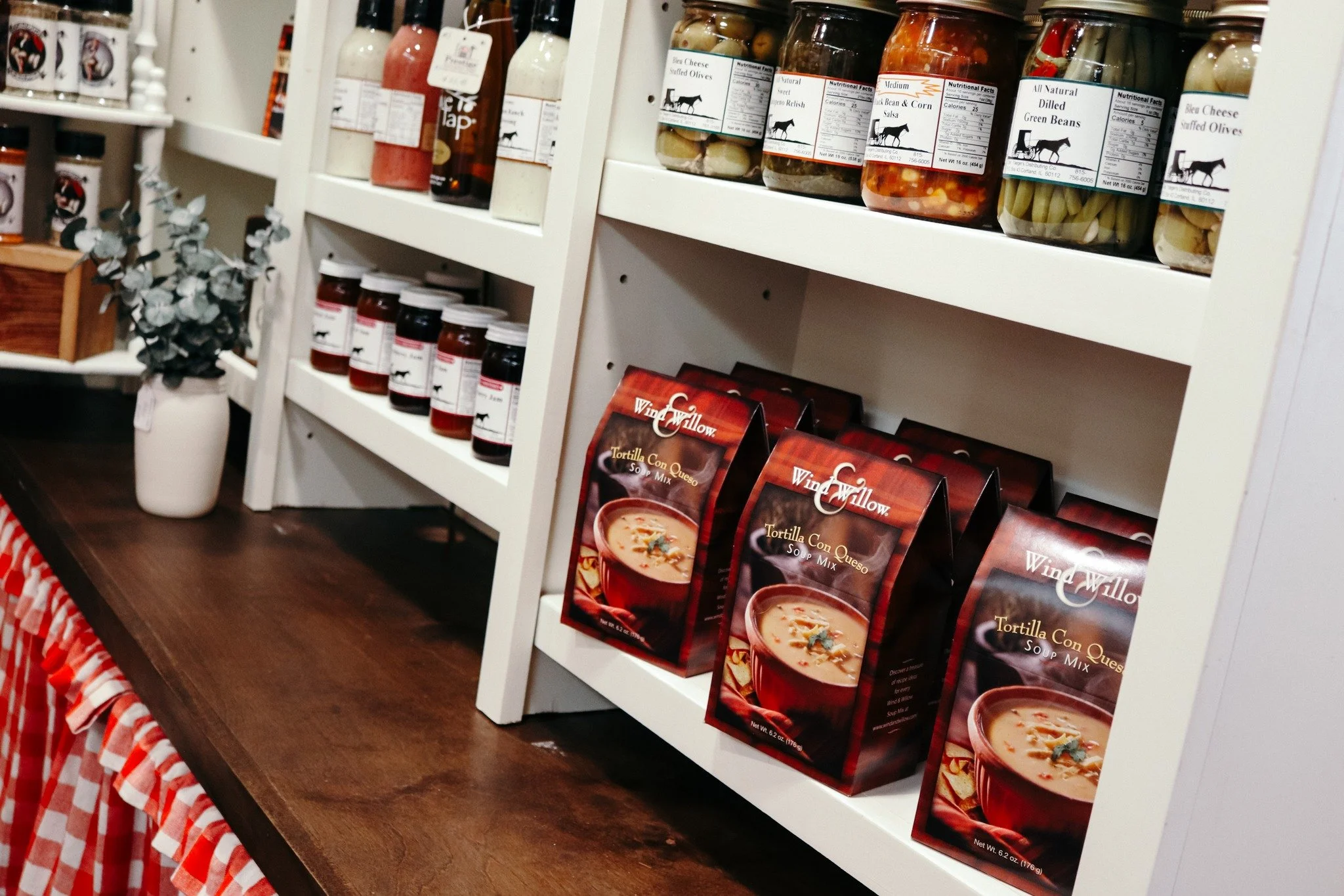 SHOP THE COUNTRY BISCUIT 🍎

Have you seen our General Store near our front entrance? Snag local honey, olive oil, soups, dips, jarred goods, pretzels, and more! All your favorites are waiting for you. Be sure to stop in to pick up a few items for yo