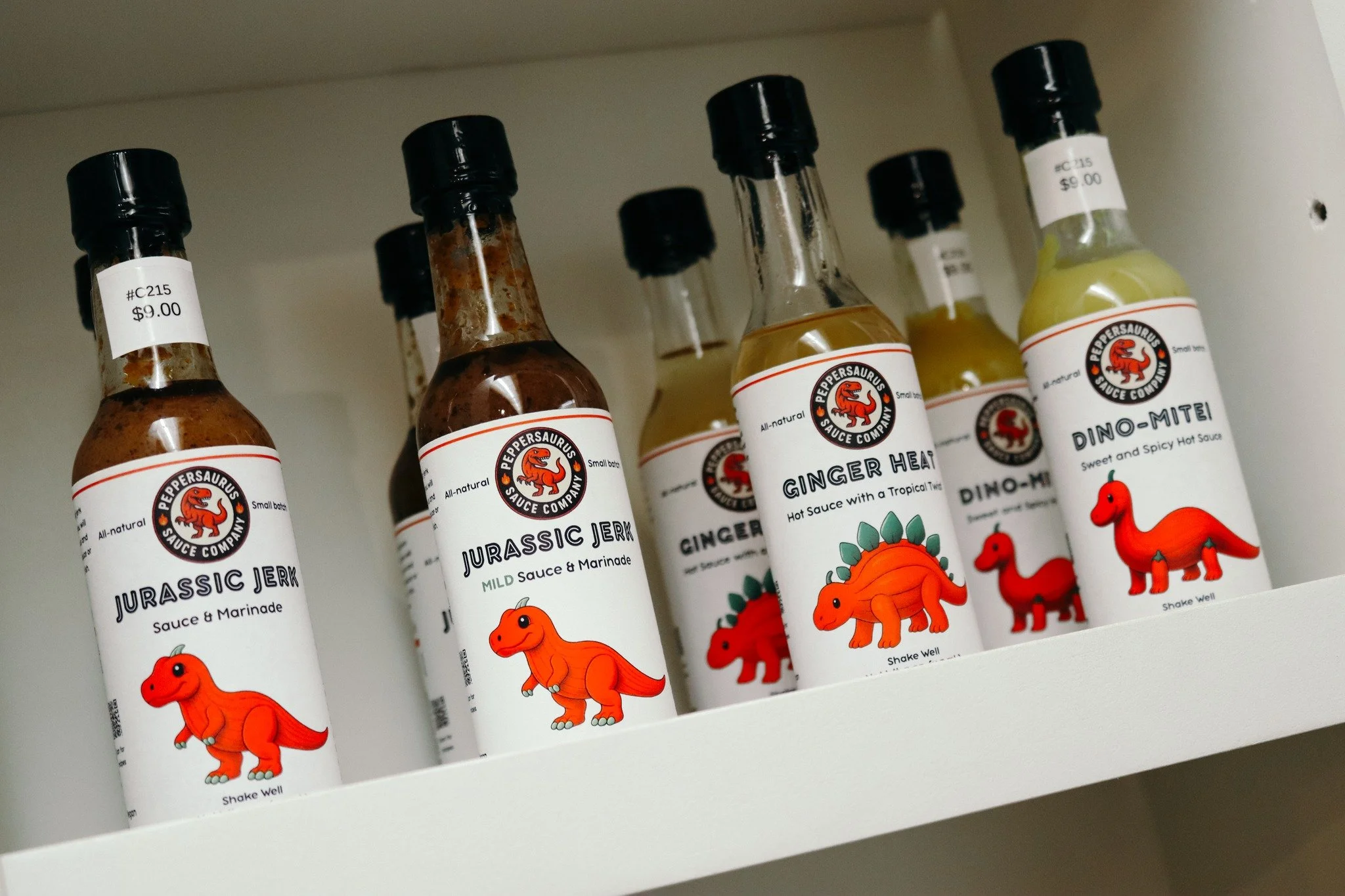 SAUCE IT UP!

We have new additions to The Country Biscuit General Store, located inside our rustic market! Jurassic Jerk, Dino-Mite, and Ginger Heat Sauces are waiting for you. Grab a couple to try yourself, or gift them to a friend who loves to coo