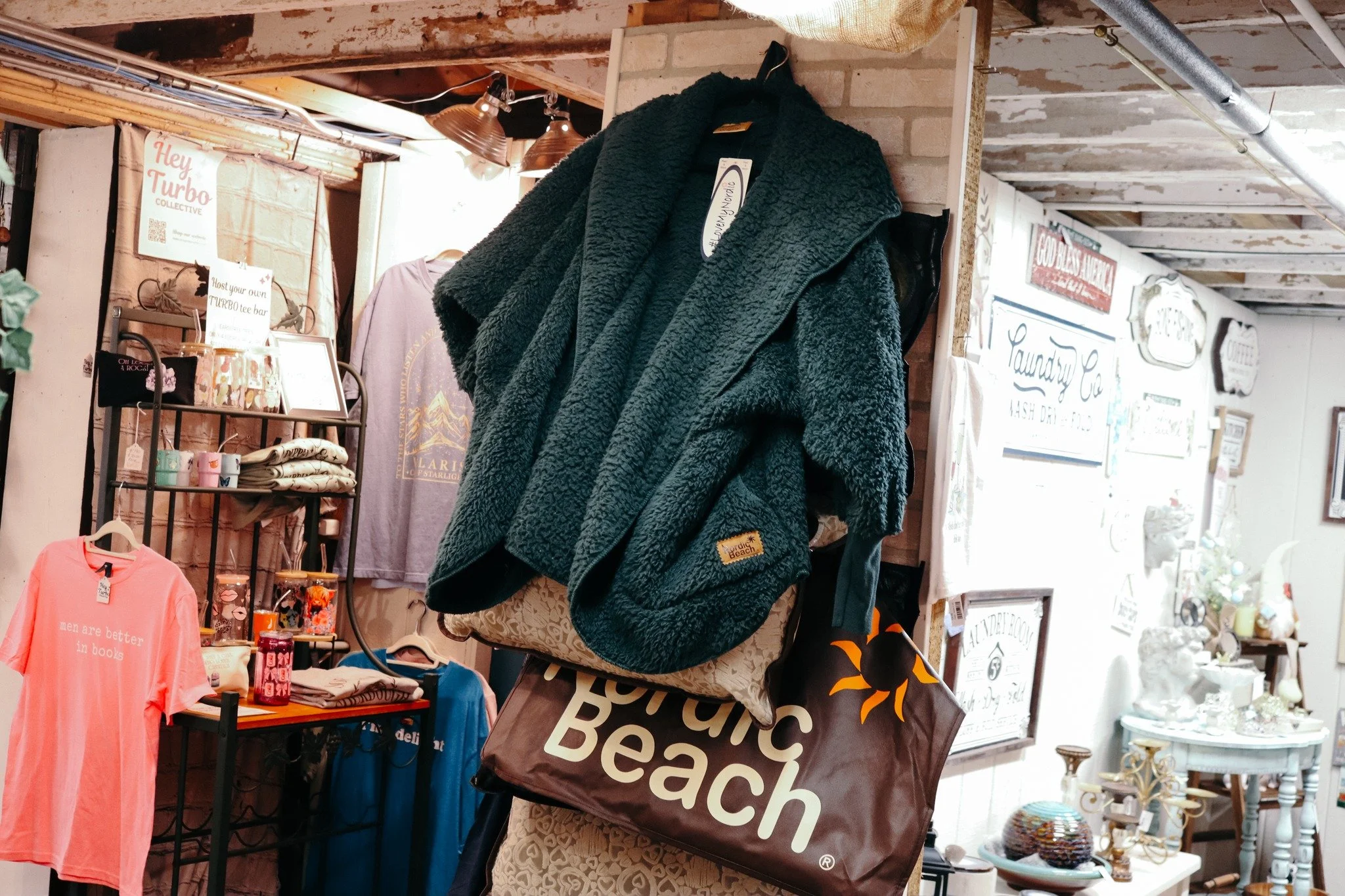 HAVE YOU SNAGGED YOURS?

If you don't own a Nordic Beach Wrap - you're missing out! This fluffy wrap is perfect for running errands, cozying up on the couch, or staying warm on your next trip. With a hood for extra snuggling and big pockets for all y