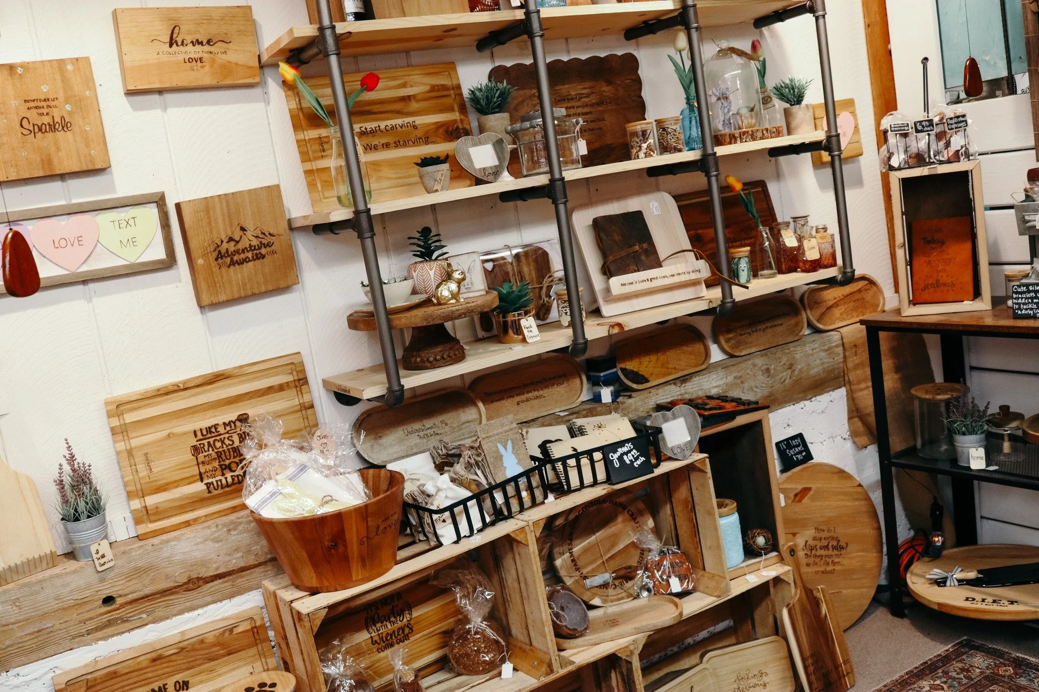 ENTERTAINING THIS WEEKEND?

Have you seen these wood cutting boards, trays, grilling accessories, and more at our market? Stop in and find a new serving option for charcuterie and appetizers, or a few accents for your place settings! We are open unti