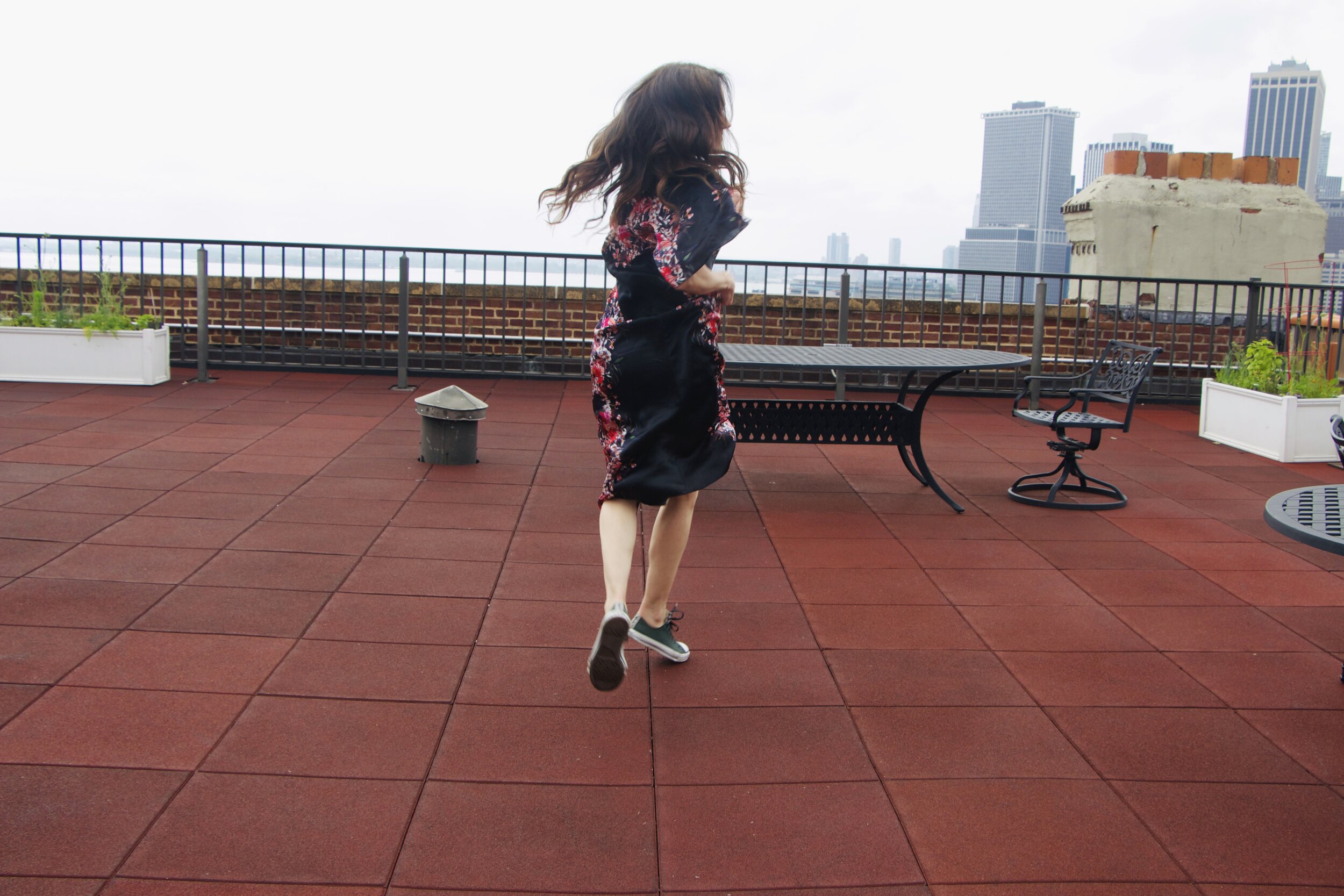 Dress by  Warm NY.  sneakers by  Converse .