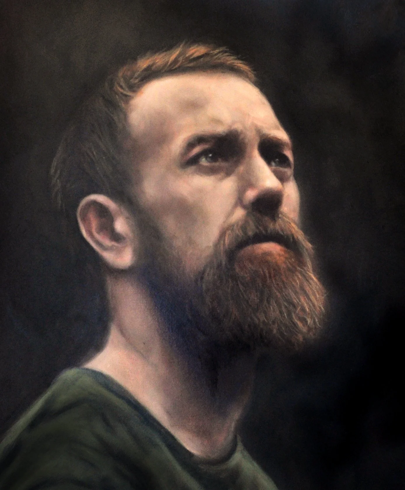 Oil painting of a young man with a beard.