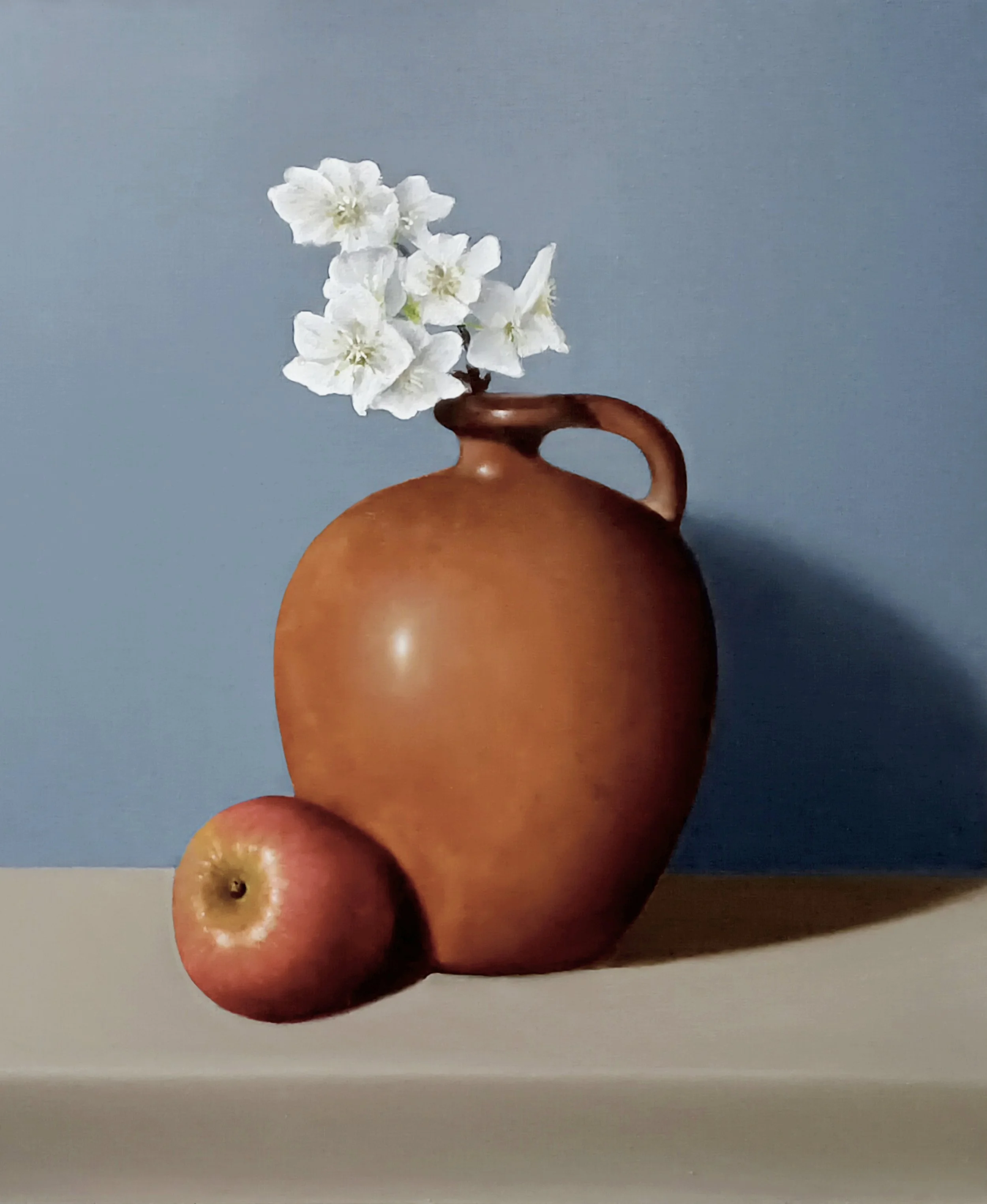 Still life oil painting of an apple, jug and blossom by Mike Skidmore.