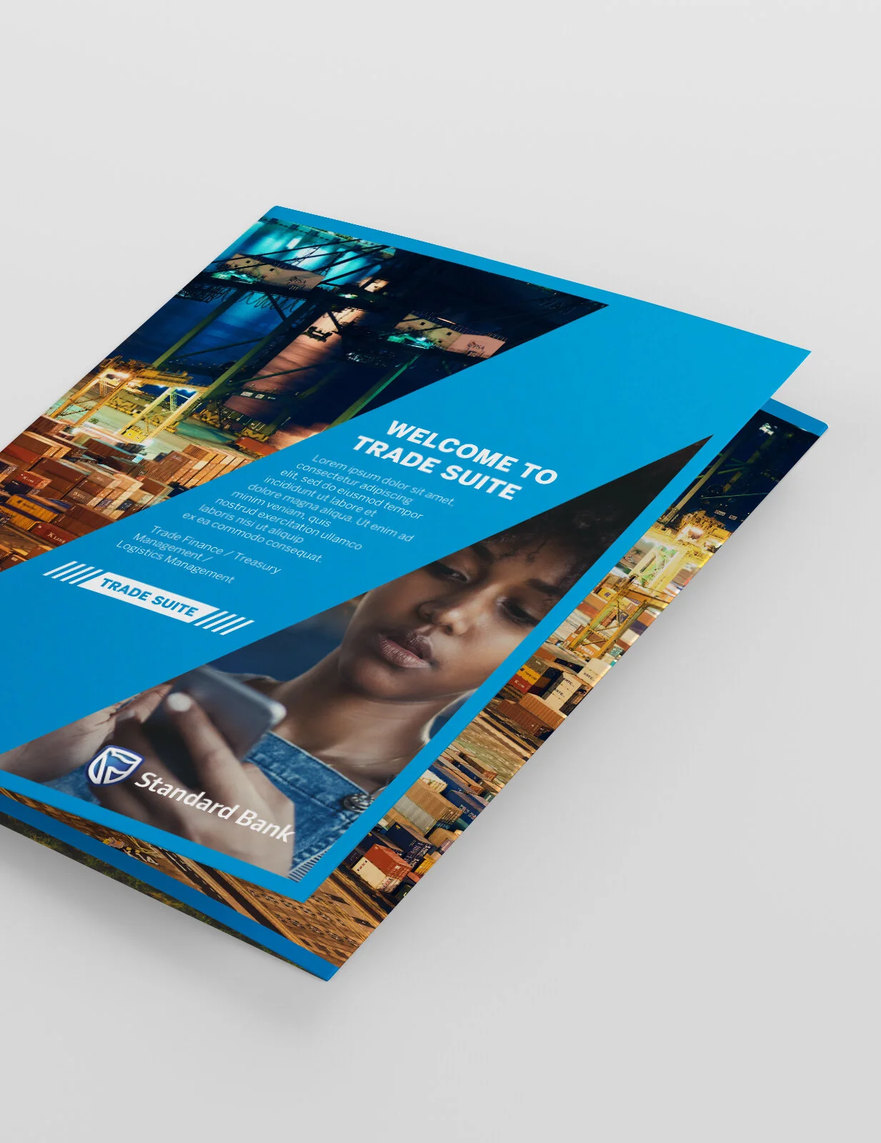 Following the company's brand guidelines, I've designed a folder containing a USB card flash drive, brochures as well as legal documents associated with Standard Bank Trade Suite.