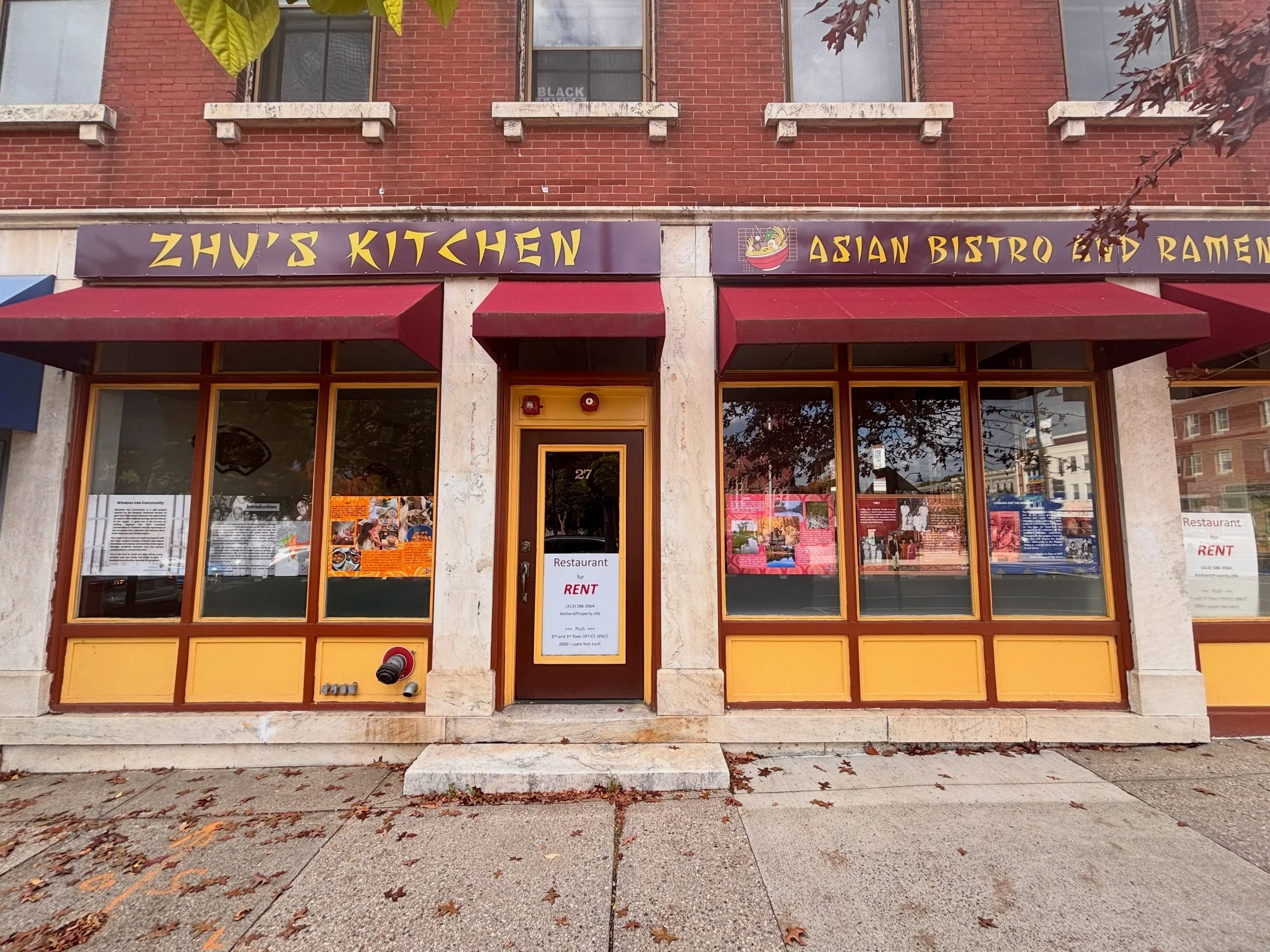 The Amherst Historical Society and Museum introduced Windows Into History in the windows of 25 S Pleasant St, formerly Zhu&rsquo;s Kitchen Asian Bistro and Ramen. Partnering with students at Amherst Regional High School, the program highlights the hi