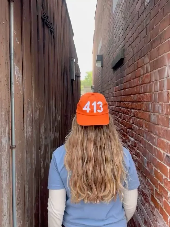 What a perfect way to show your love for 413🫶🧢 Available in 4 different colors. Purchase in the Amherst Visitors Center (35 S Pleasant) or on our website!(Link in bio!) #413 #amherst #downtownamherst