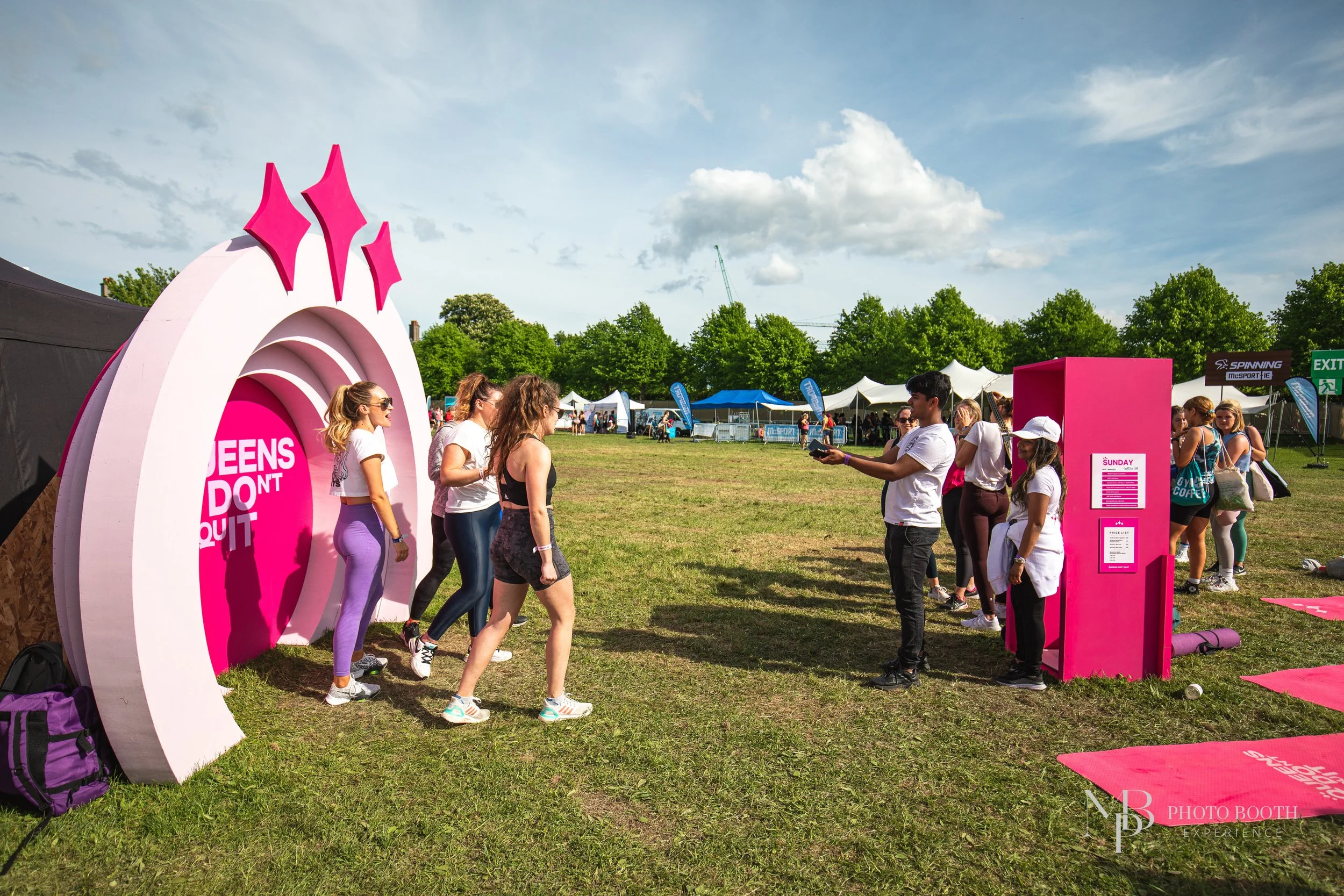 Interactive outdoor experiential marketing activation with custom branded installations and roaming guest engagement experience in Texas