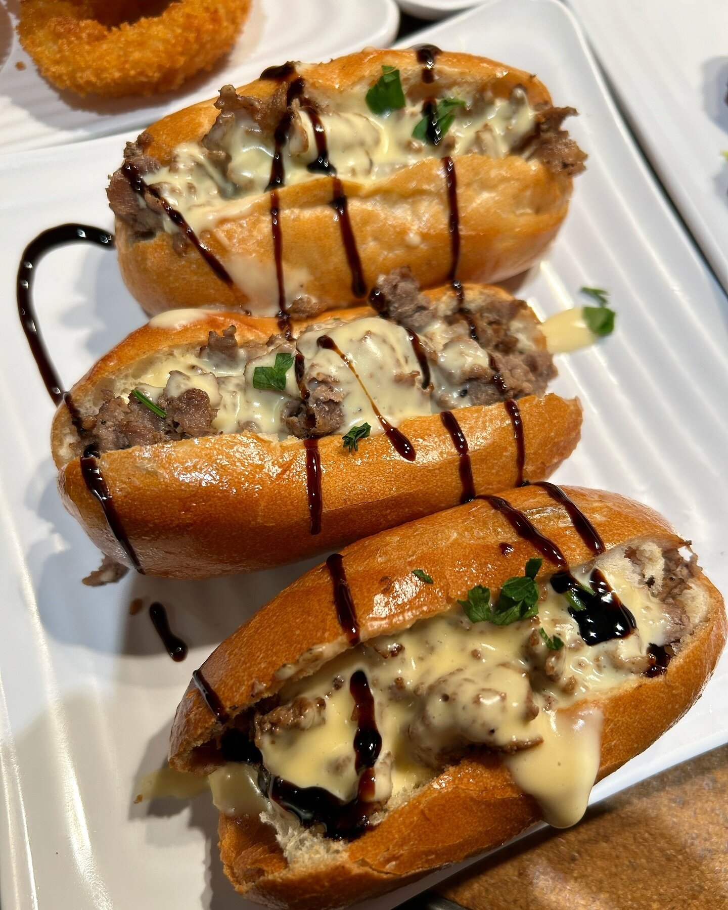 Cheesesteak Sliders 🤤 $7 for happy hour! Perfect if you just want a bite of a classic Philly cheesesteak! 
.
.
.
.

#happyhour #phillyhappyhour #philly #phillybars #pizza #beer #happyhourphilly #centercity #sips #midtownvillage #highnoon #phillybars