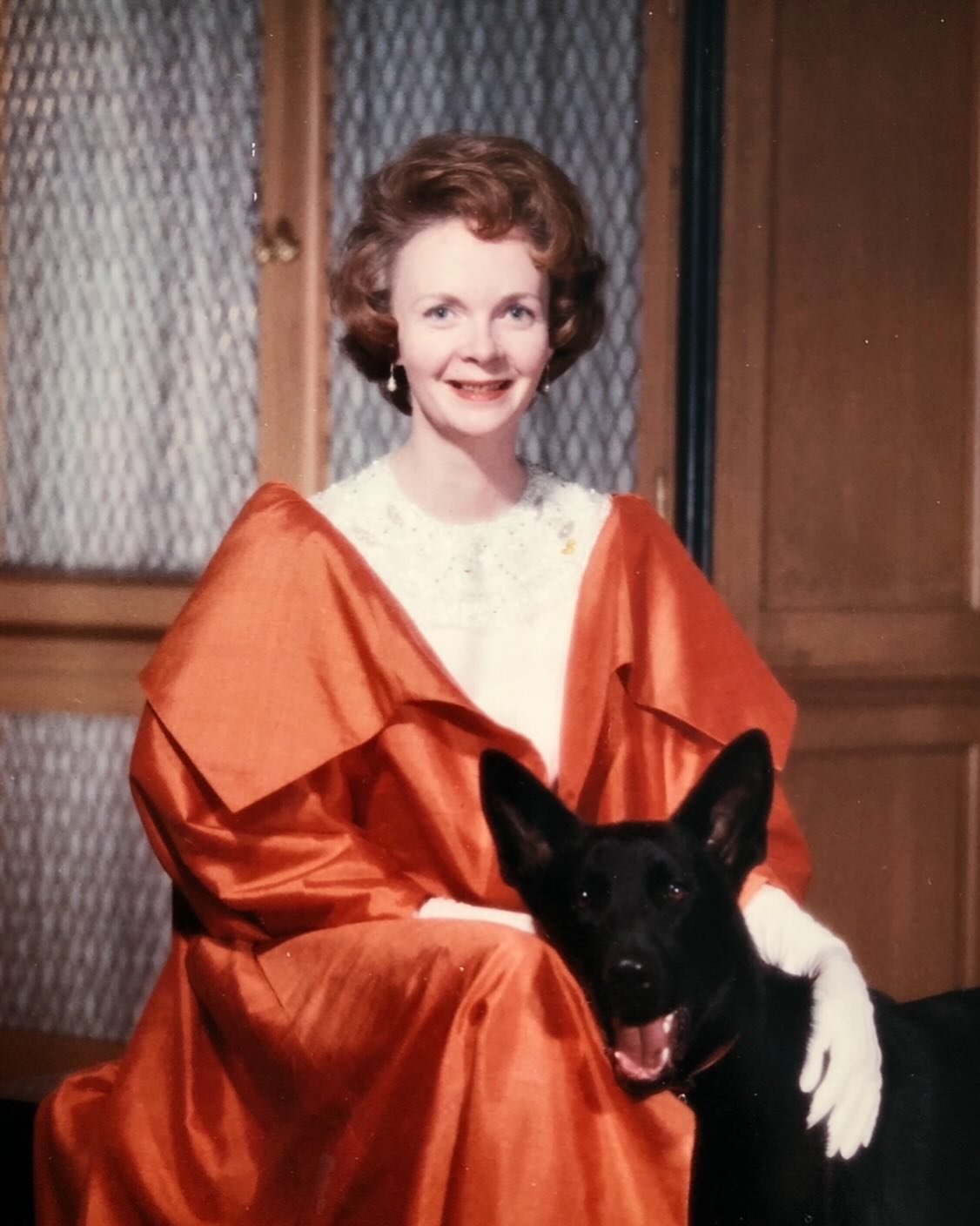 A portrait of my Mother in the late 1950&rsquo;s with Bruno. She is wearing a bright orange full length evening coat she had custom made in Hong Kong on one of my parents many trips there. Those pearl earrings are still with me.

I love this portrait