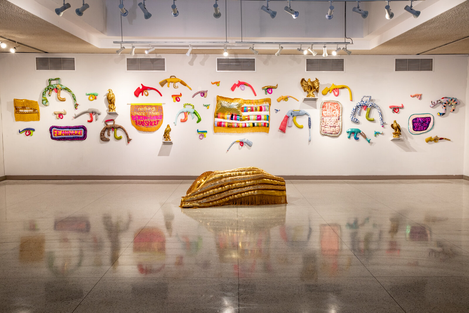 Natalie Baxter, Selections from Warm Gun, 2014-2020 Alt Caps, 2017-2019; Bloated Flags, 2016-2020; The Squad, 2018. Fabric, cotton batting, polyfill.