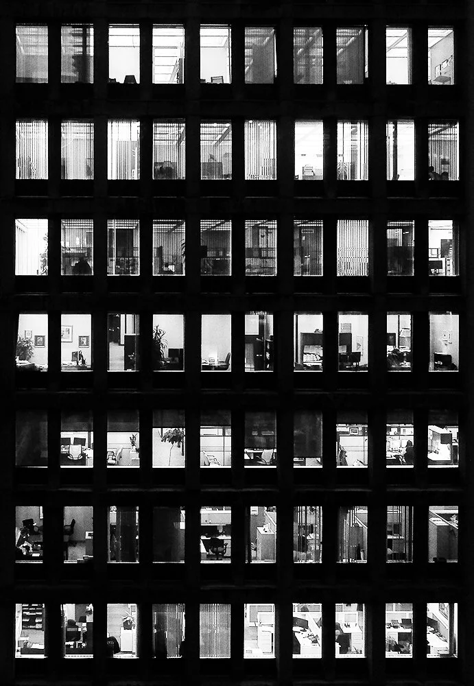 Allan Florendo Slice of Life I see through these tiny boxes, some empty, and some having a life on its own. Everything converges in this magnificent architectural structure of concrete and steel, remembering people who have built it both in
