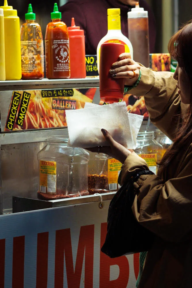 Ian Heffernan Smokie, 2020 The hot dog stands on the corner of Granville and South Georgia are a permanent fixture of the city and something so familiar to anybody living here. This corner is one of the most vibrant in the city somewhere whi