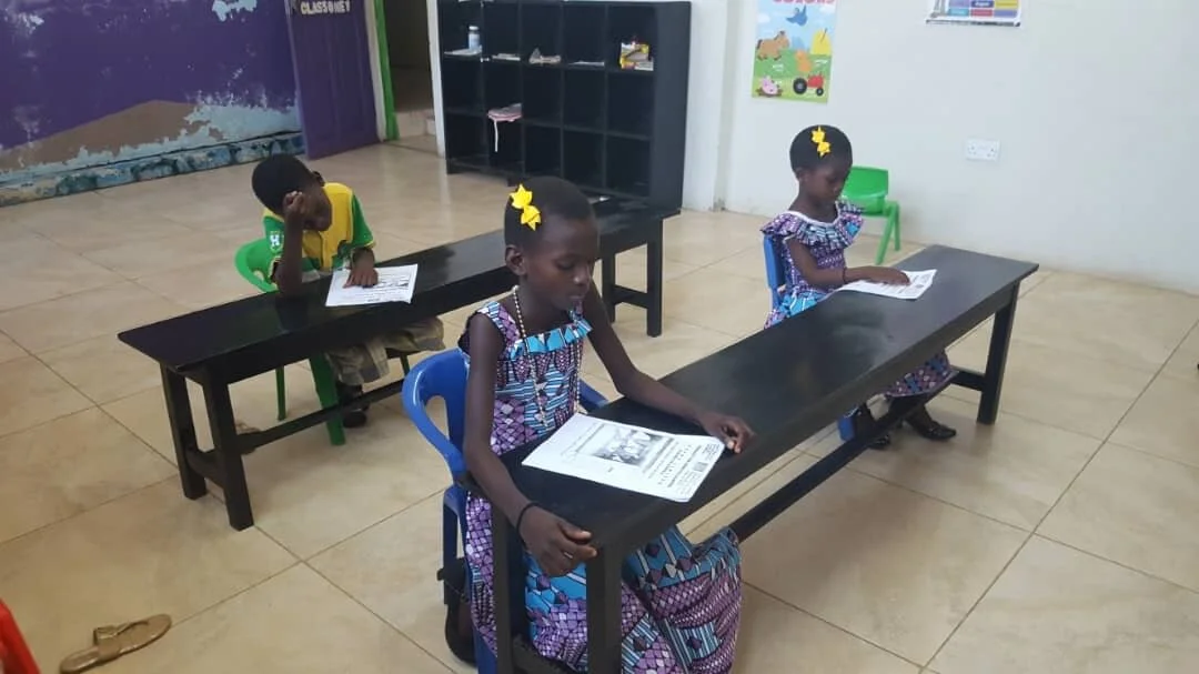 Providing desk for students in Ghana 