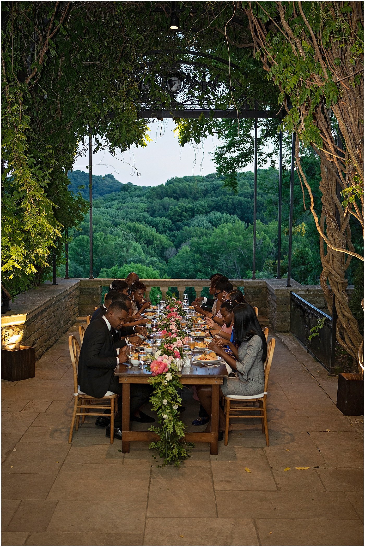 Dining under the wisteria arbor venue for their Cheekwood Estate and Garden Wedding