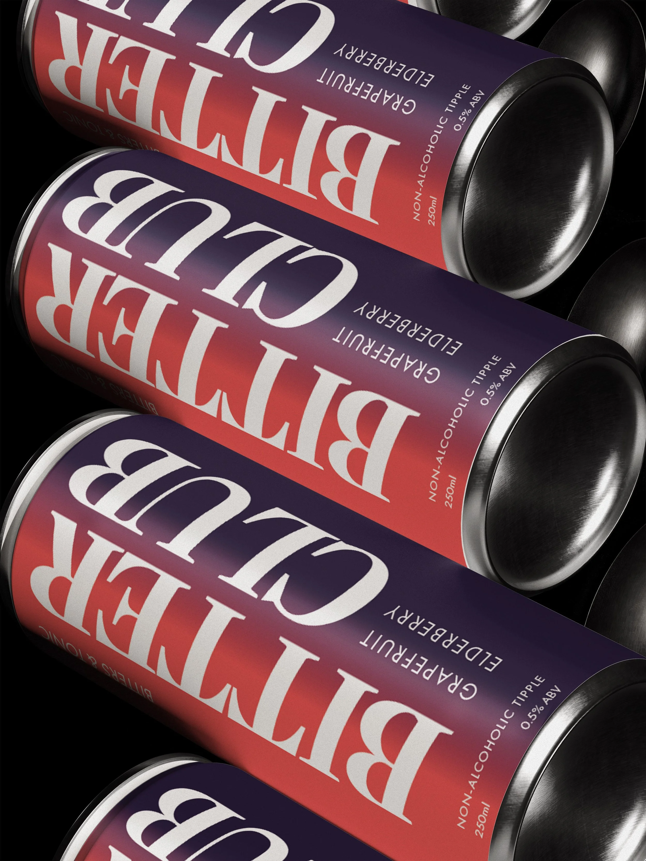 Close-up of cans of bitters and tonic - the new non-alcoholic drink from The Bitter Club.  Eye-catching cans lying on a black surface, showing the top and side of the cans.