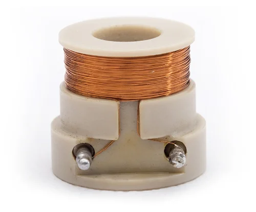 A small electrical coil with copper wire wrapped around a white plastic base.