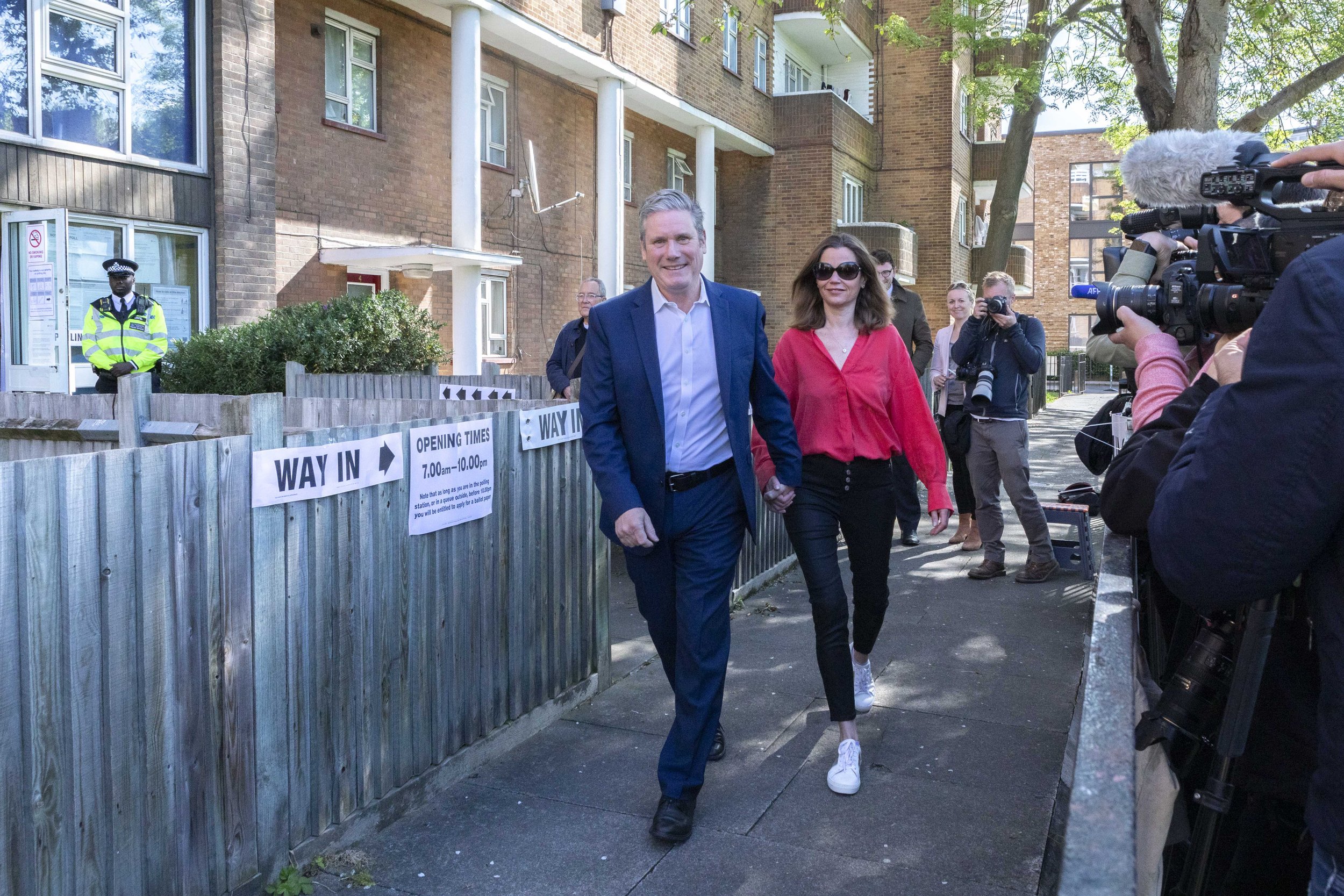  Labour Party leader Sir Keir Starmer (L) casts a vote at the local elections in North London with wife Victoria (R) - May 2022.  