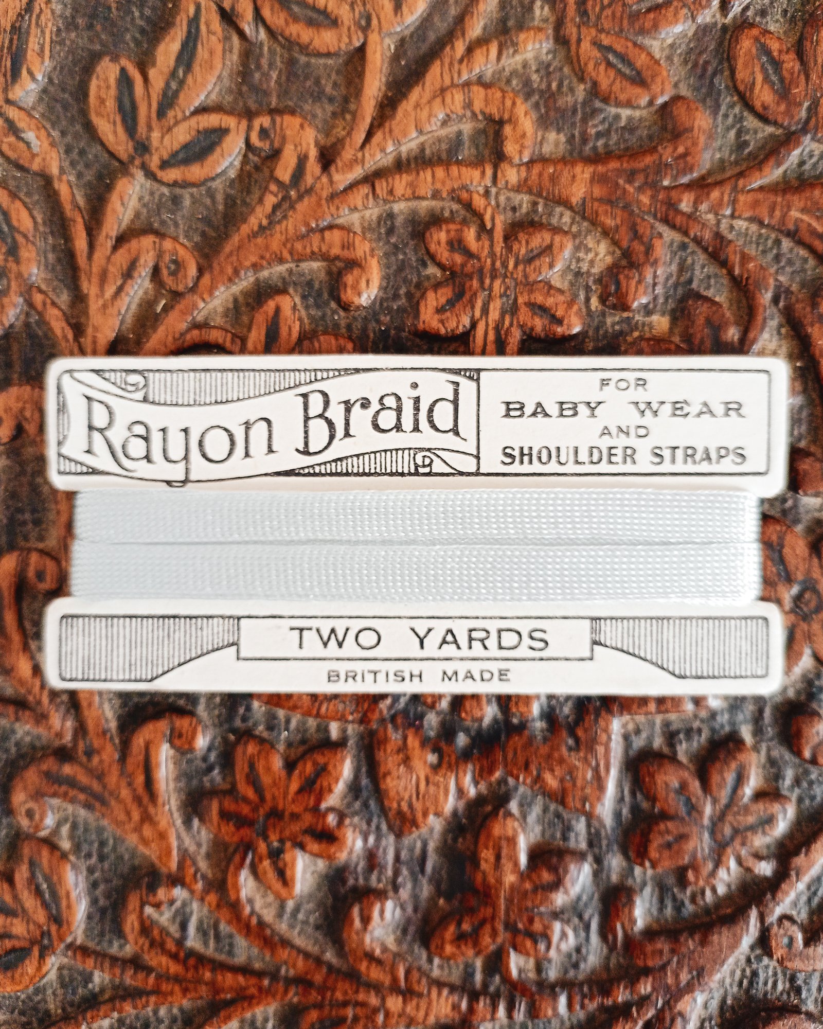 Card of vintage blue rayon braid