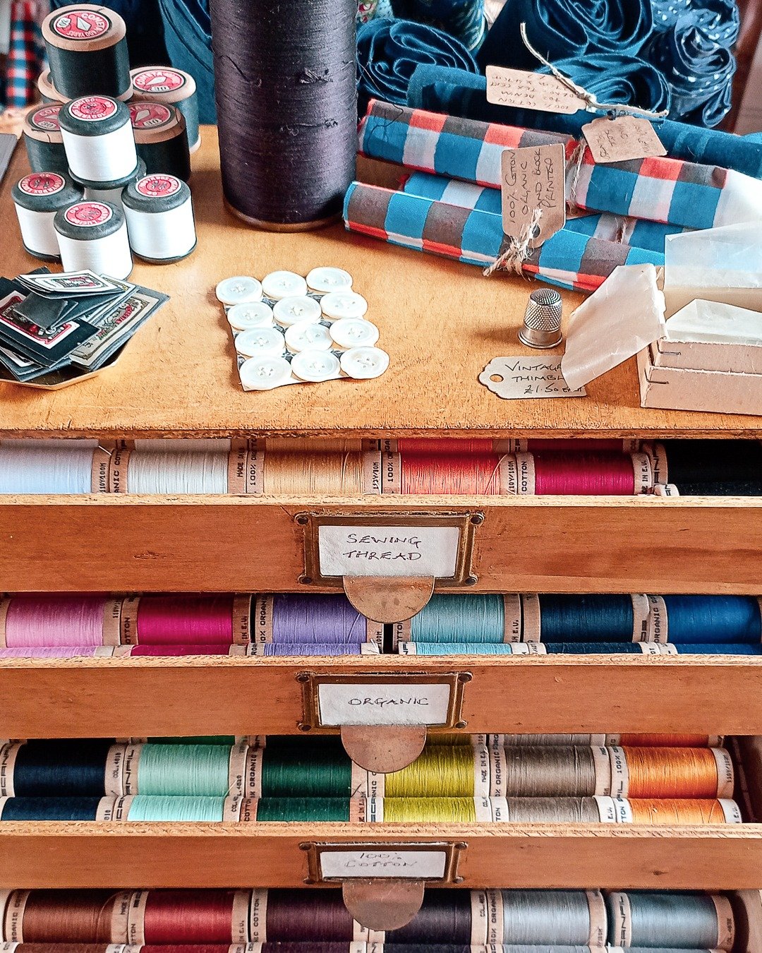 Upstairs with the haberdashery, we now have a good selection of organic cotton threads, on wooden spools so no plastic.