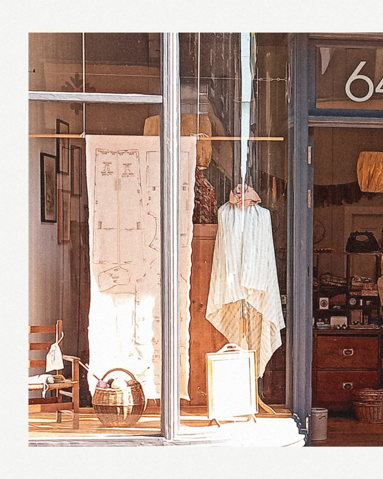 We're thinking about our next window display, so I thought I'd try to show you the whole of the shop front before we make the change.
It's a lovely building but does get the full force of the sunshine in Summer, which limits what we can use in the di