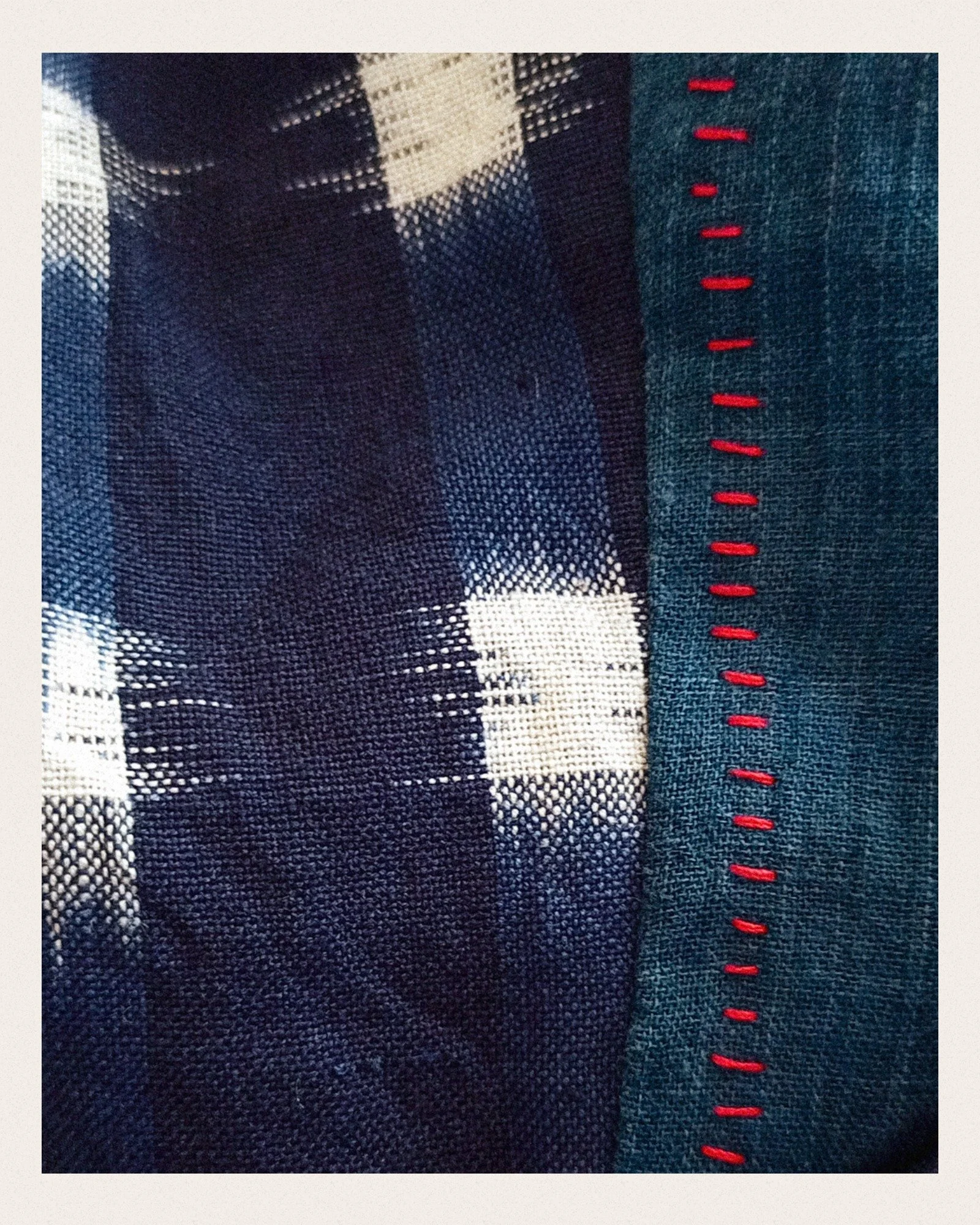 I'm making a skirt from this lovely blue ikat fabric, sewing it entirely by hand.
Got a bit bogged down with how to finish the edges, but once I'd decided to fully embrace the hand sewing and not try to copy machine sewing techniques I'm enjoying it 