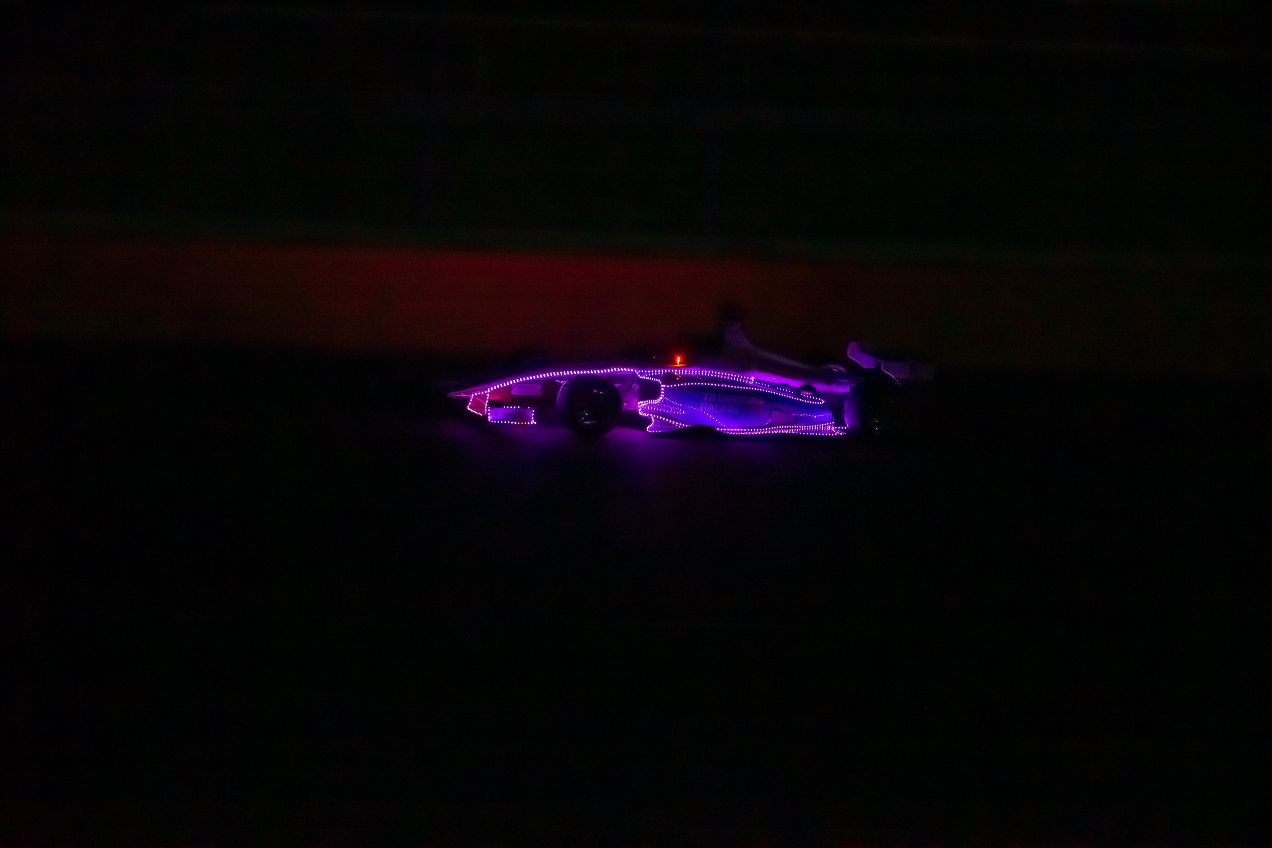   TII Unimore races the IAC AV-24 in the dark at the Autonomous Challenge @ CES. Credit Indy Autonomous Challenge.  