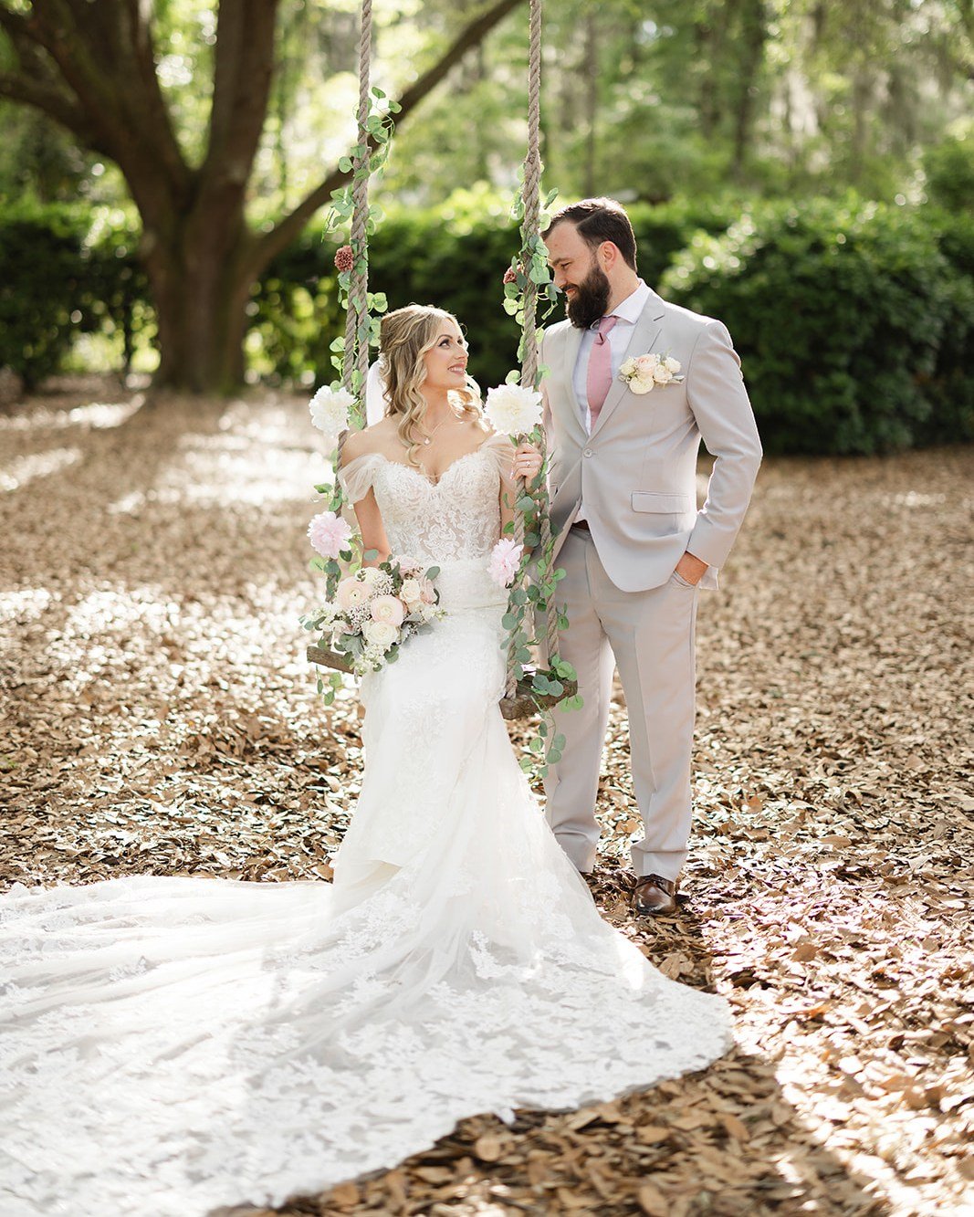 Sarah's amazing dress had the perfect train! Don't you love how it drapes off our swing? So romantic! 

(Check out our previous post to see the train during the wedding ceremony!)

@brookeimages
@coastalcoordinating

#weddingday #brideandgroom #newly