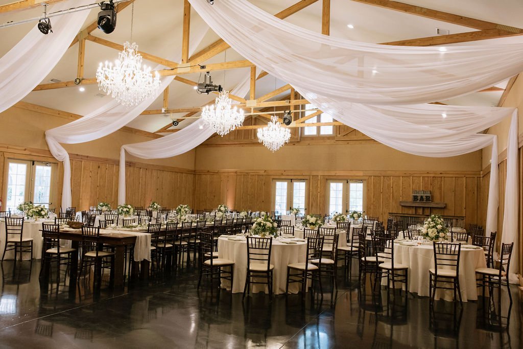 Looking for a reception space that you can truly make your own? 

Bowing Oaks has the foundation you need - crystal chandeliers, ceiling draping, and elegant chiavari chairs. Just add your personality! Whether you are looking for something simple and