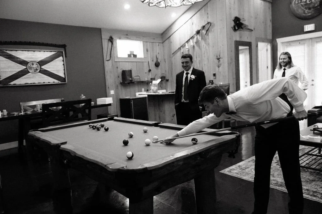 Lots of wedding venues in Jacksonville have beautiful bridal suites for the ladies to get ready on the wedding day - but at Bowing Oaks, we take care of the men too! Our spacious groom's suite features a bar, an 80" television, and a pool table,