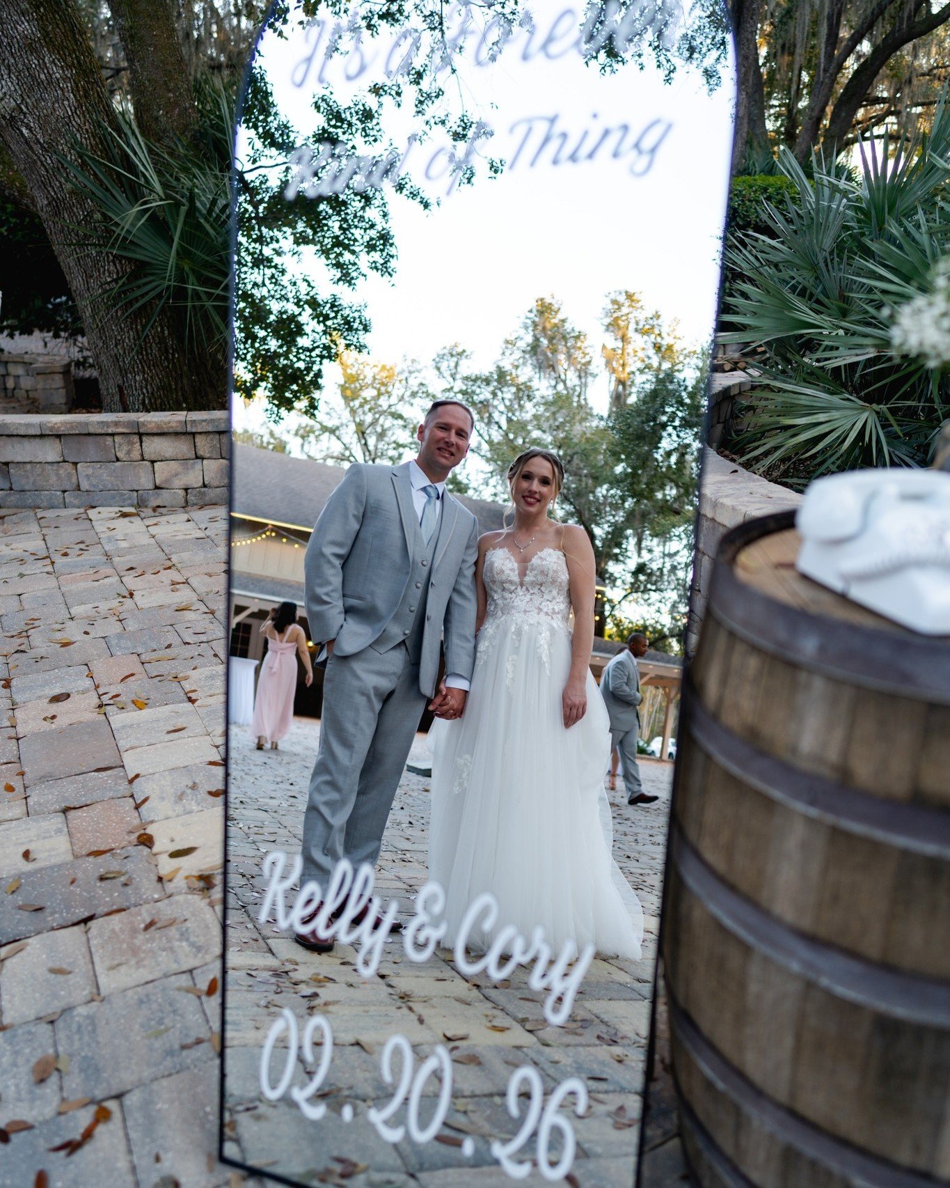 A little reflection before the celebration begins.

This mirror was designed as a fun photo moment for guests, but it also created the perfect backdrop for a quiet portrait of the couple together. A simple detail that became part d&eacute;cor, part e