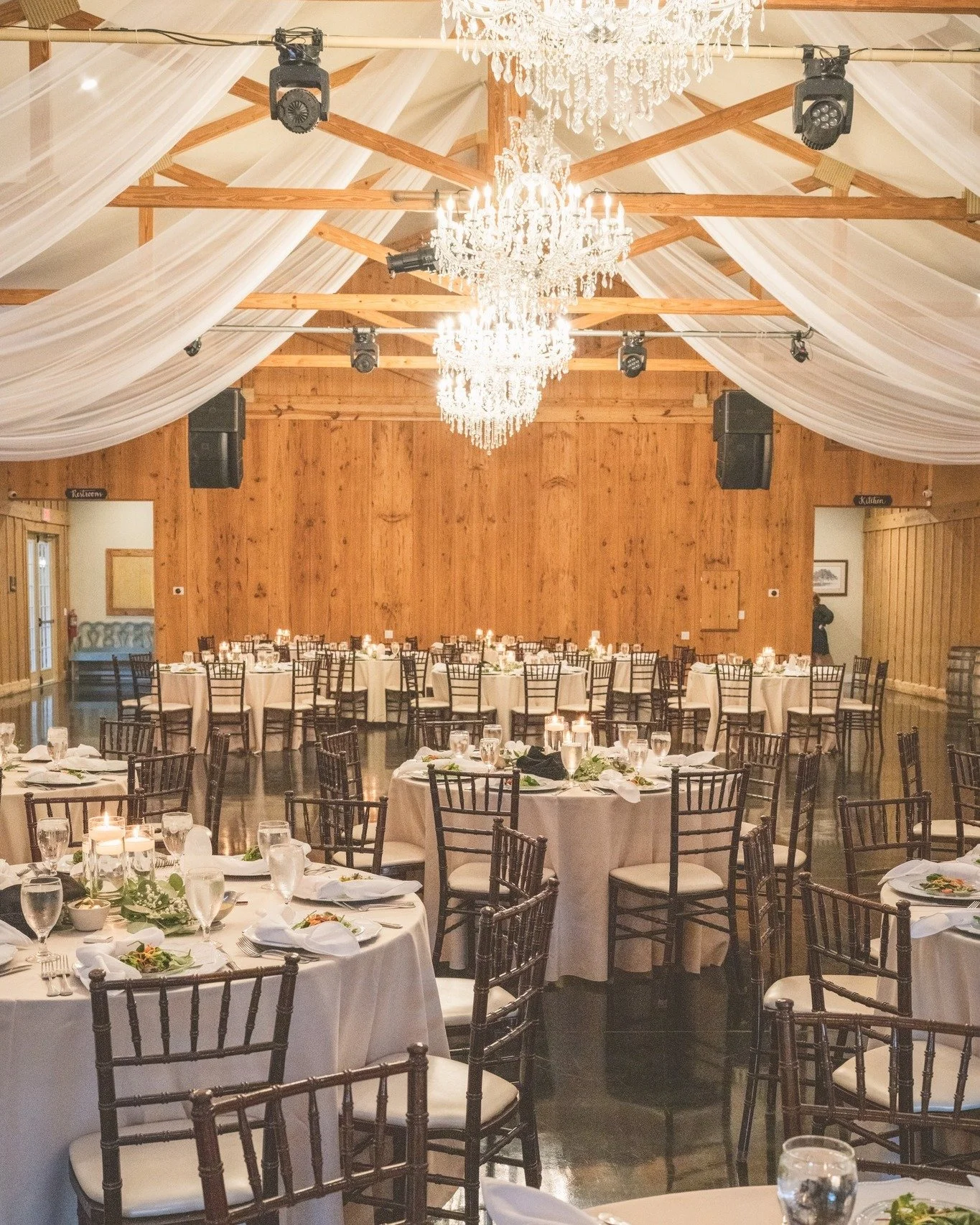 The candles are lit, the salads are served, the water is poured... It's time to celebrate! 

There's something magical about those final moments before guests enter the reception. Every place setting is ready, the flowers are perfectly arranged, and 