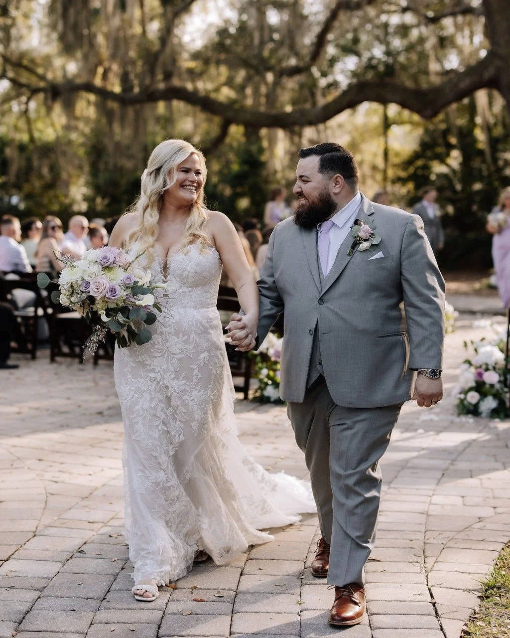 The vows have been exchanged, the rings are on, and now it's time to celebrate! Just look at those smiles!

Your wedding day should be filled with moments like this, when you're completely present, soaking up the happiness, and enjoying every second 