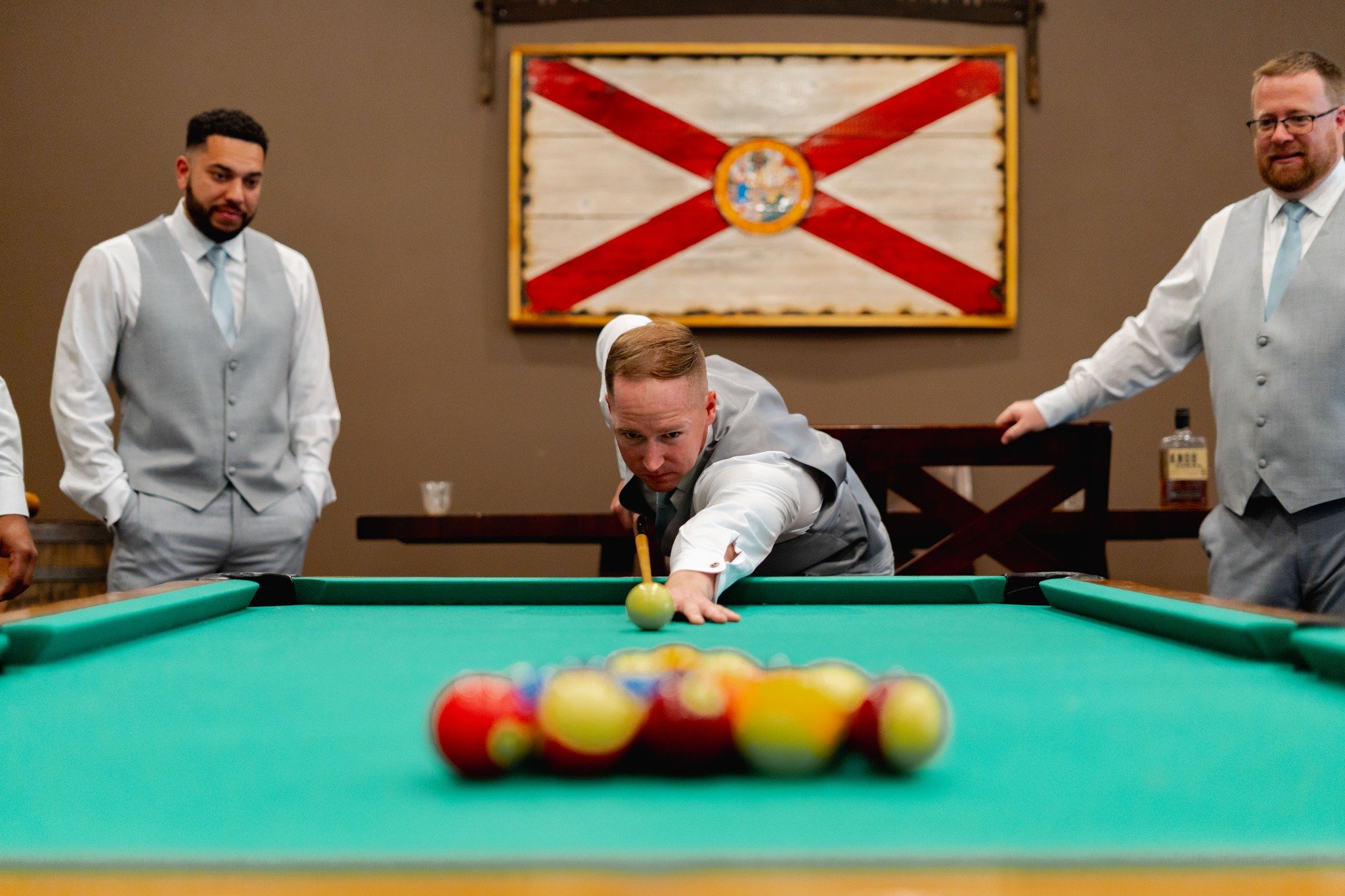 Same wedding day. Two very different getting-ready vibes! 🎱💄

Over in the groom's suite, there's a little friendly competition happening around the pool table. Meanwhile, in the bridal suite, it's all about those sweet moments with Mom, a few finis