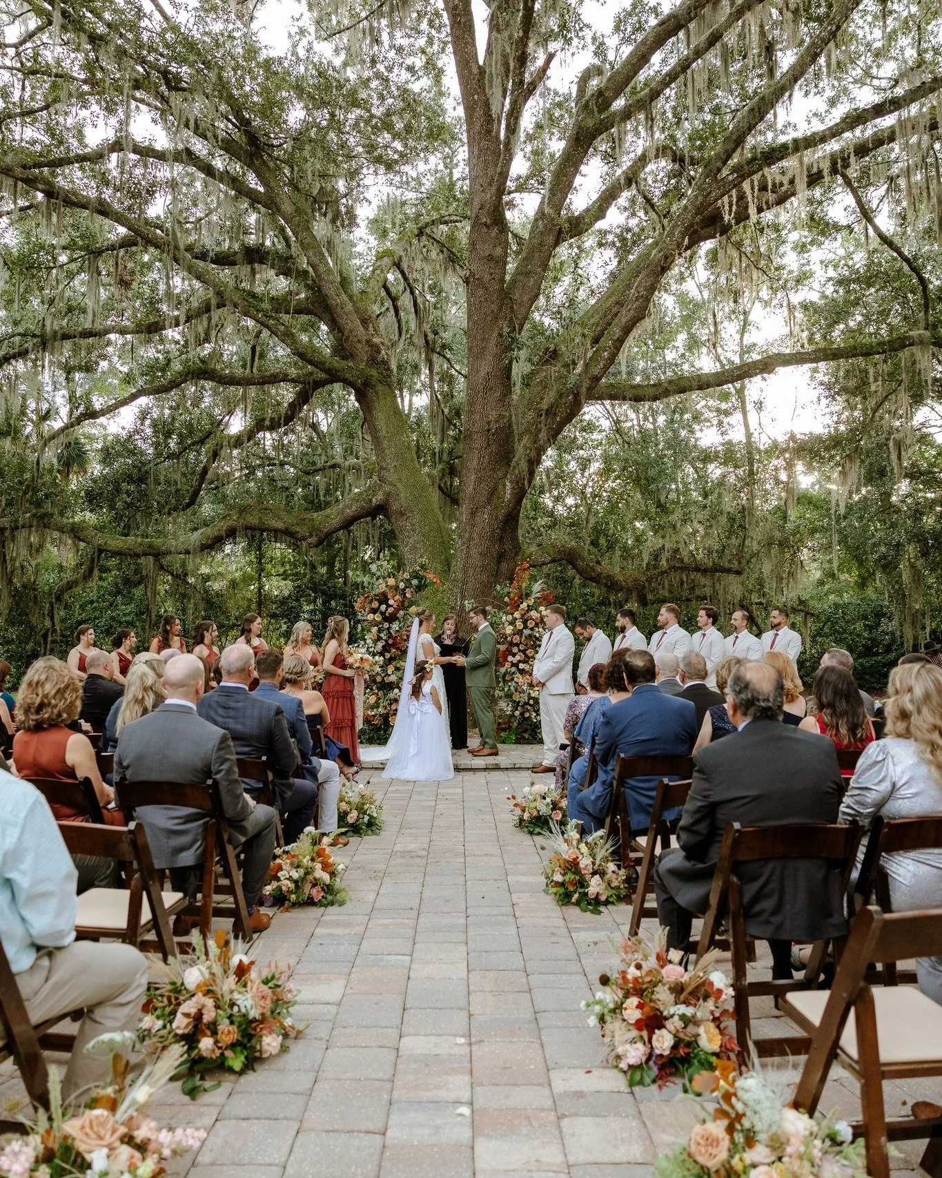 Rich, warm tones are one of our favorite ways to bring a little autumn inspiration into a wedding day. Think terracotta, rust, burnt orange, dusty rose, and soft peach, all paired with natural greenery for a look that's romantic, inviting, and full o